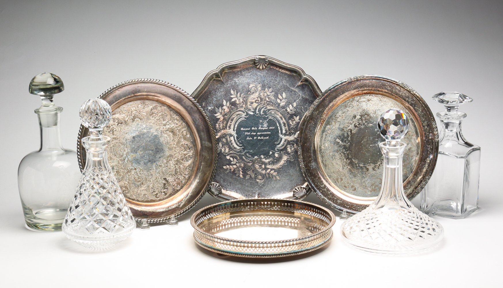 FOUR SILVERPLATE TRAYS WITH GLASS