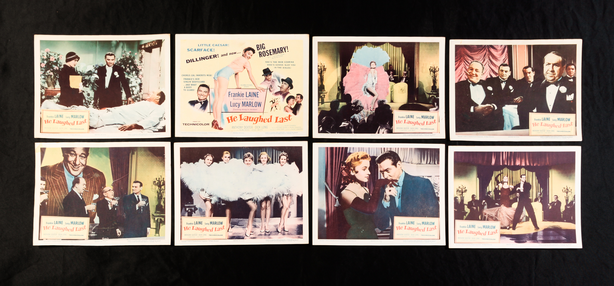 SET OF EIGHT HE LAUGHED LAST LOBBY CARDS.
