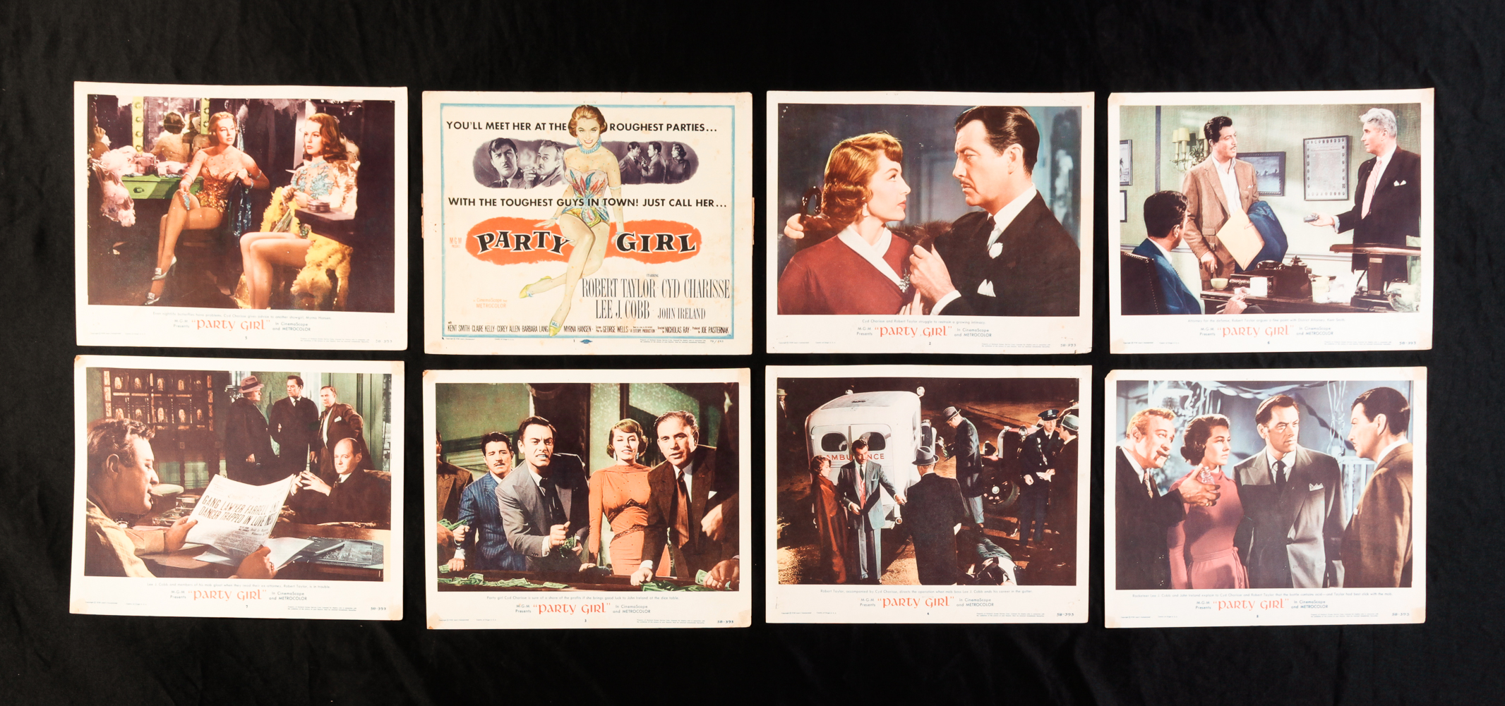 SET OF EIGHT PARTY GIRL LOBBY CARDS.