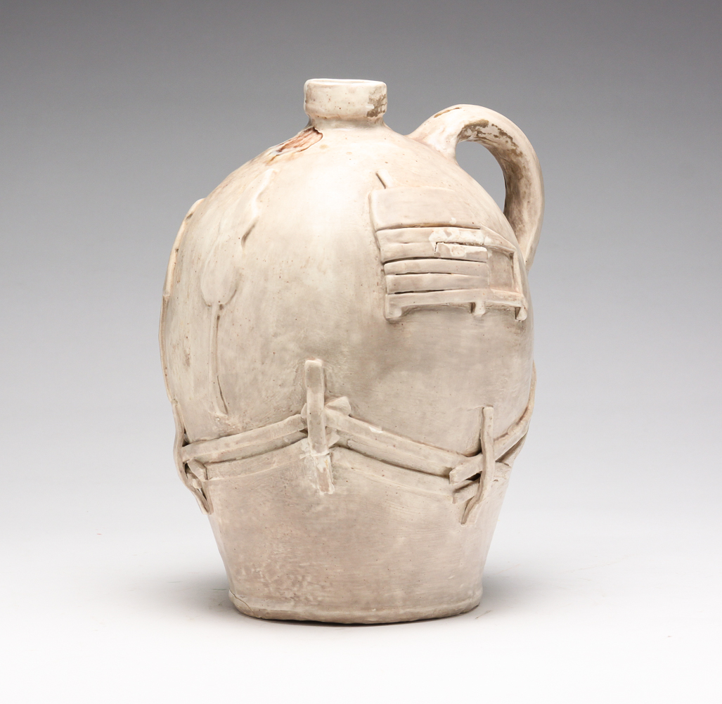 FOLK ART POTTERY JUG BY NOAH LANDIS.