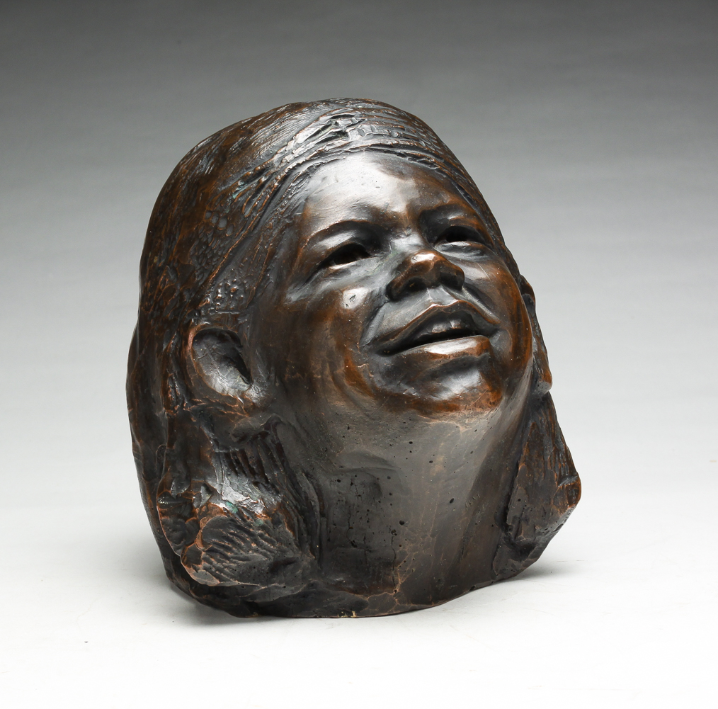 SCULPTURE OF A CHILDS HEAD. Second