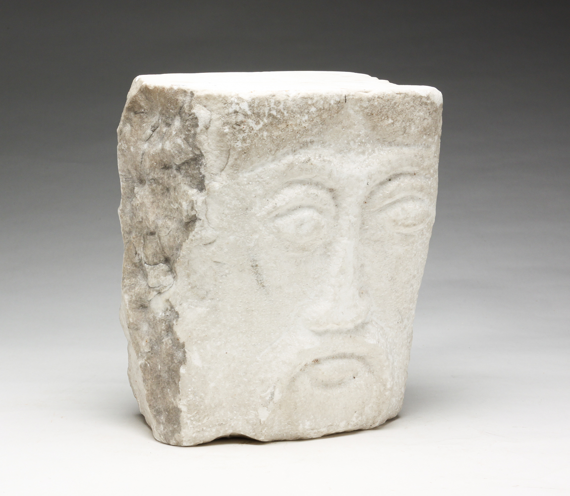 FOLK ART MARBLE CARVING OF FACE.