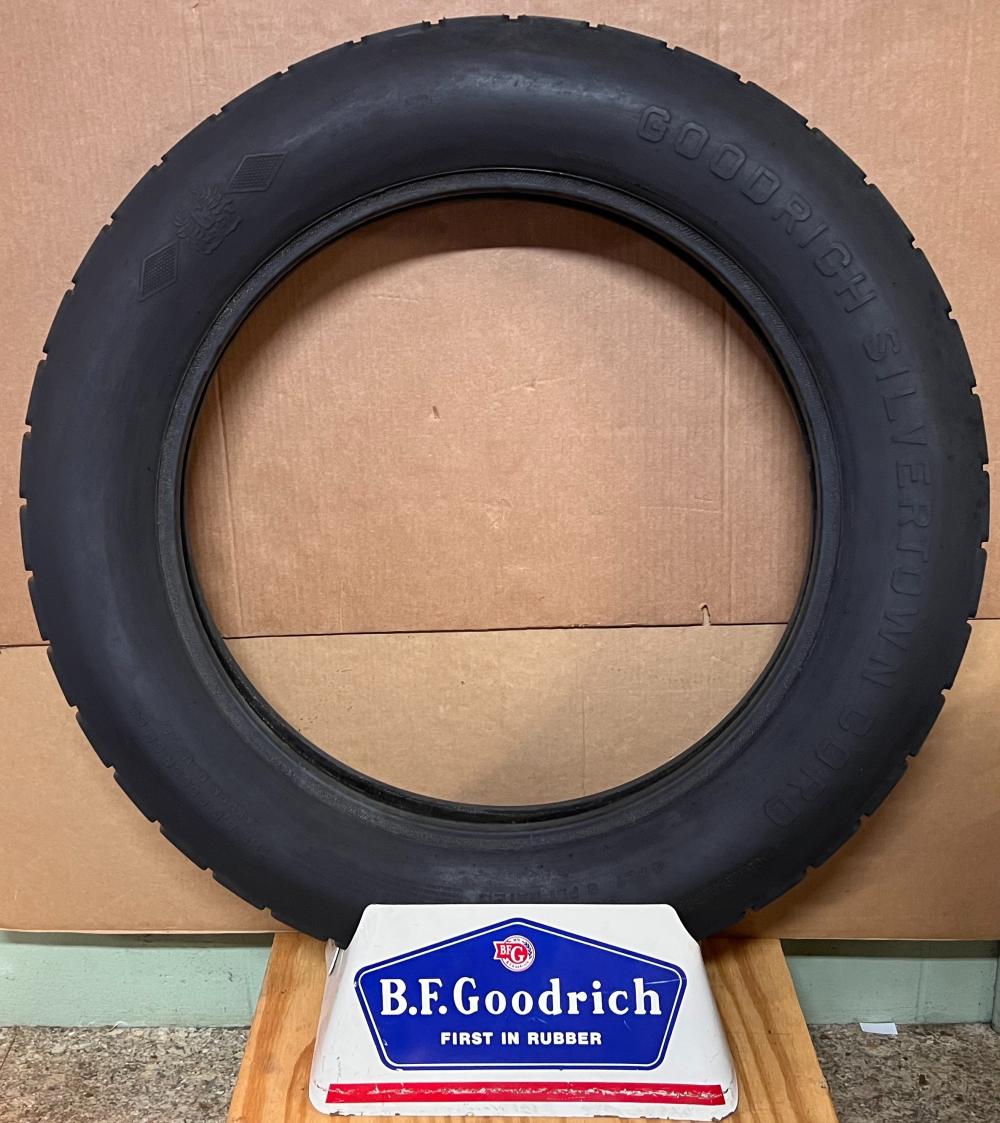 EARLY BF GOODRICH TIRE AND STAND,