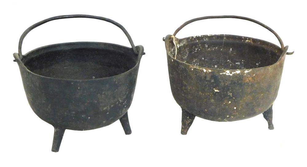 TWO EARLY IRON SWING HANDLE POTS  2e2ae0