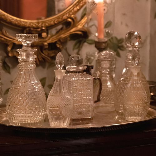 GROUP OF EIGHT GLASS DECANTERS