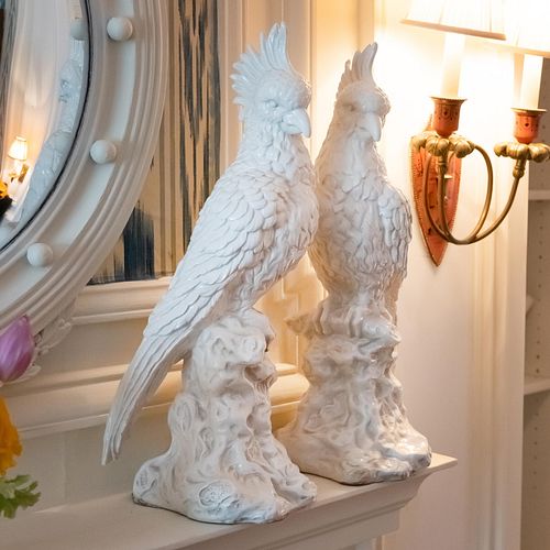 PAIR OF WHITE GLAZED CERAMIC MODELS 2e399e