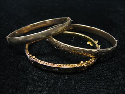 Three yellow gold bangles    victorian