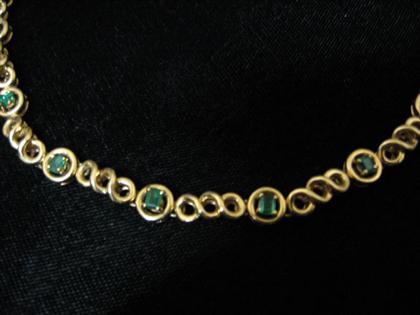 Yellow gold and emerald necklace   