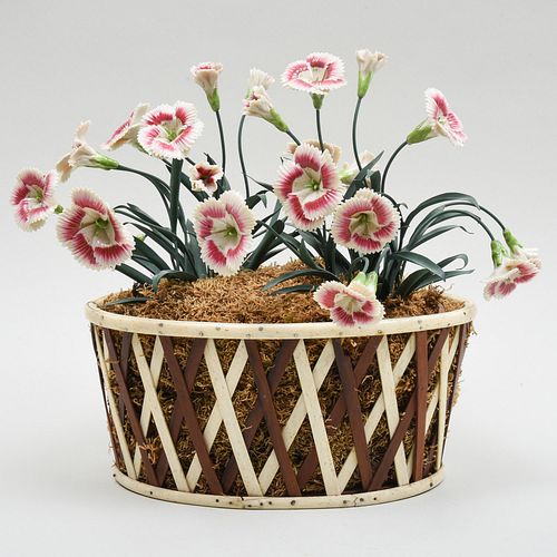 PORCELAIN AND TOLE MODEL OF CARNATIONS