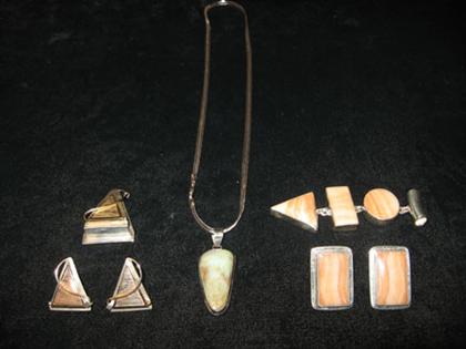 Group of assorted pendants and