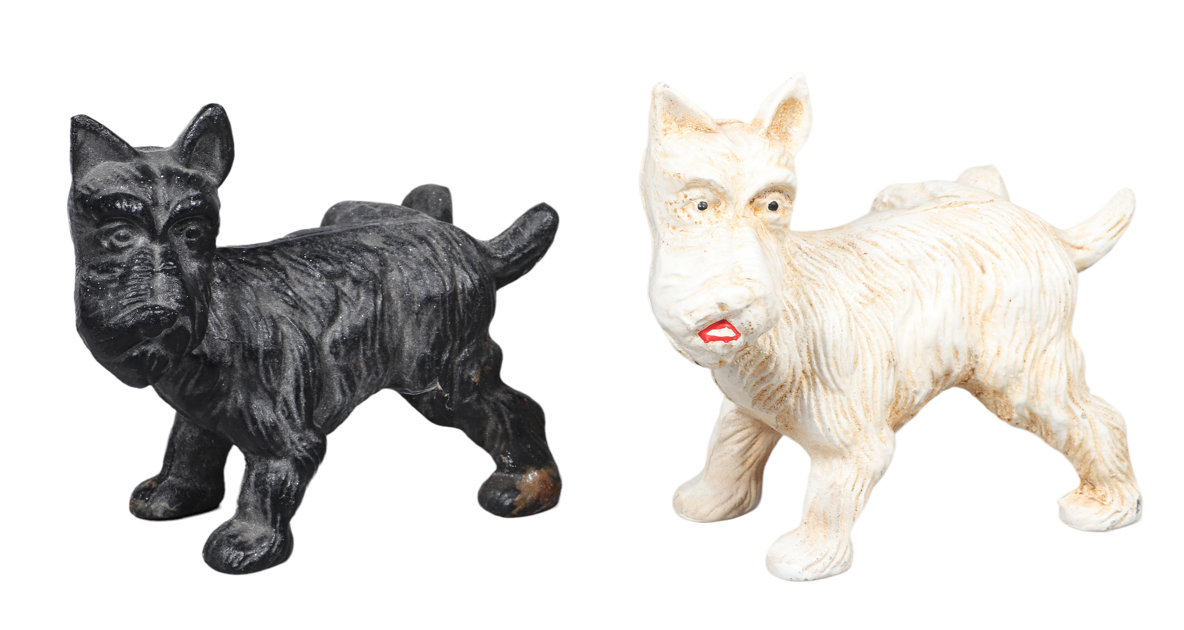 (2) Cast iron Scottish Terrier