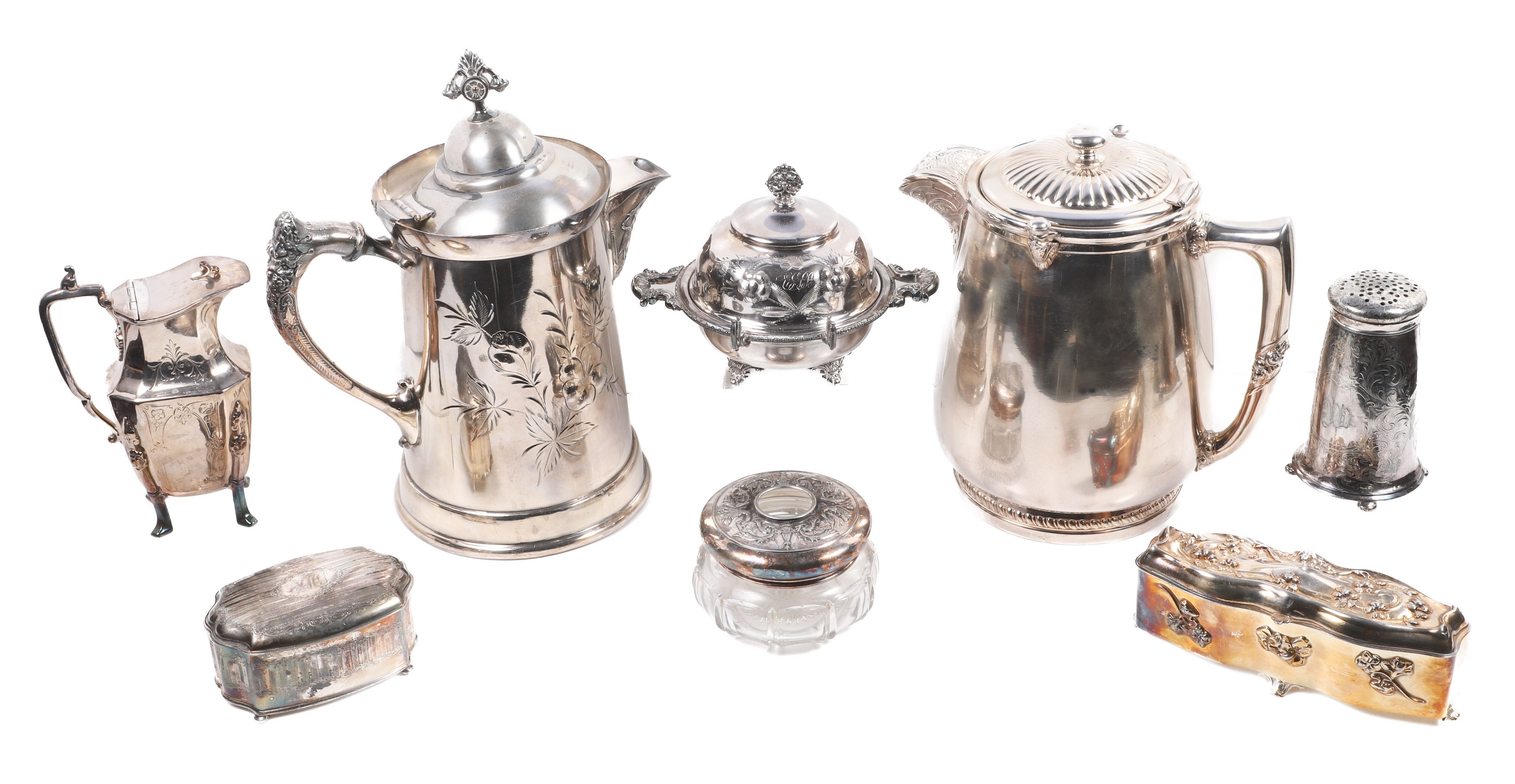 Victorian silverplate pitchers and table