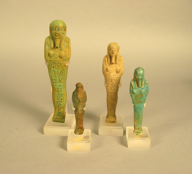 Group of four terra cotta Egyptian