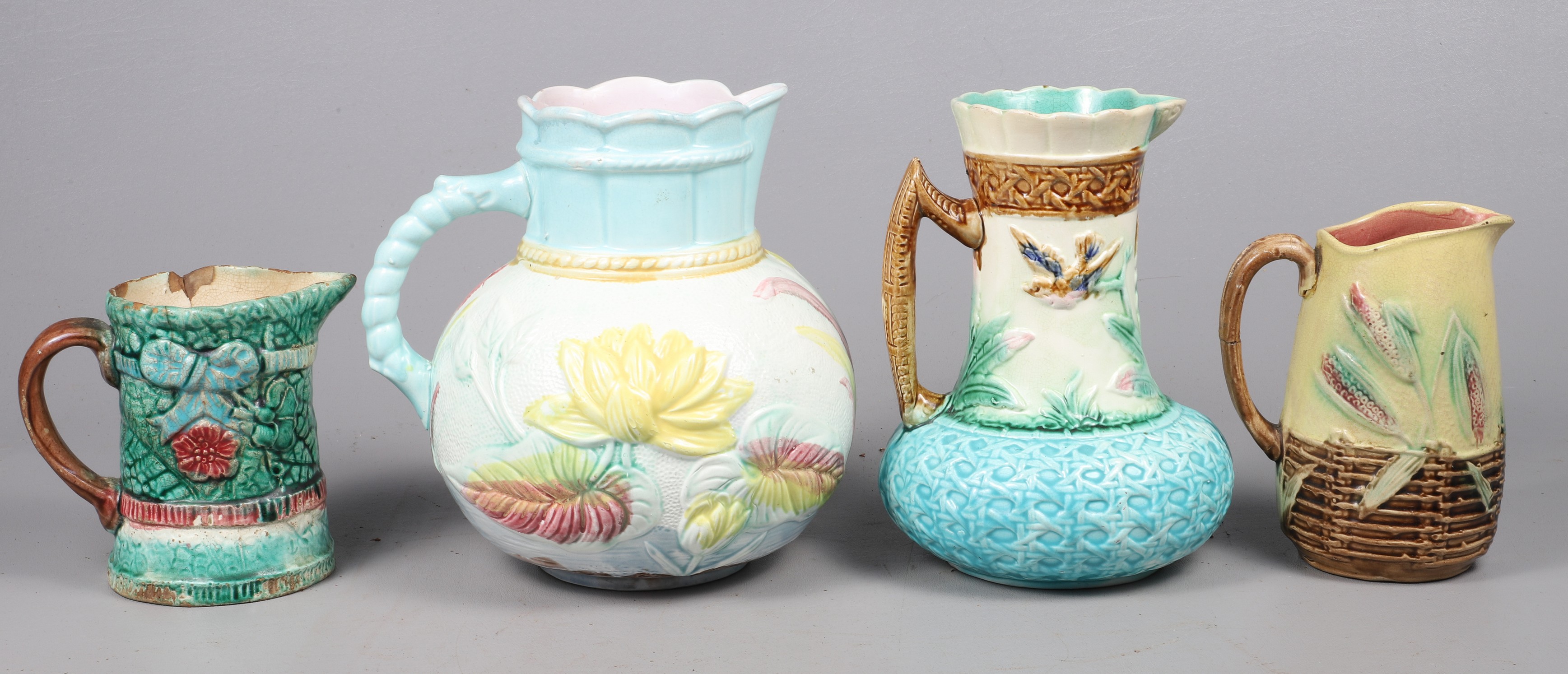 (4) Majolica pitchers, c/o Samuel