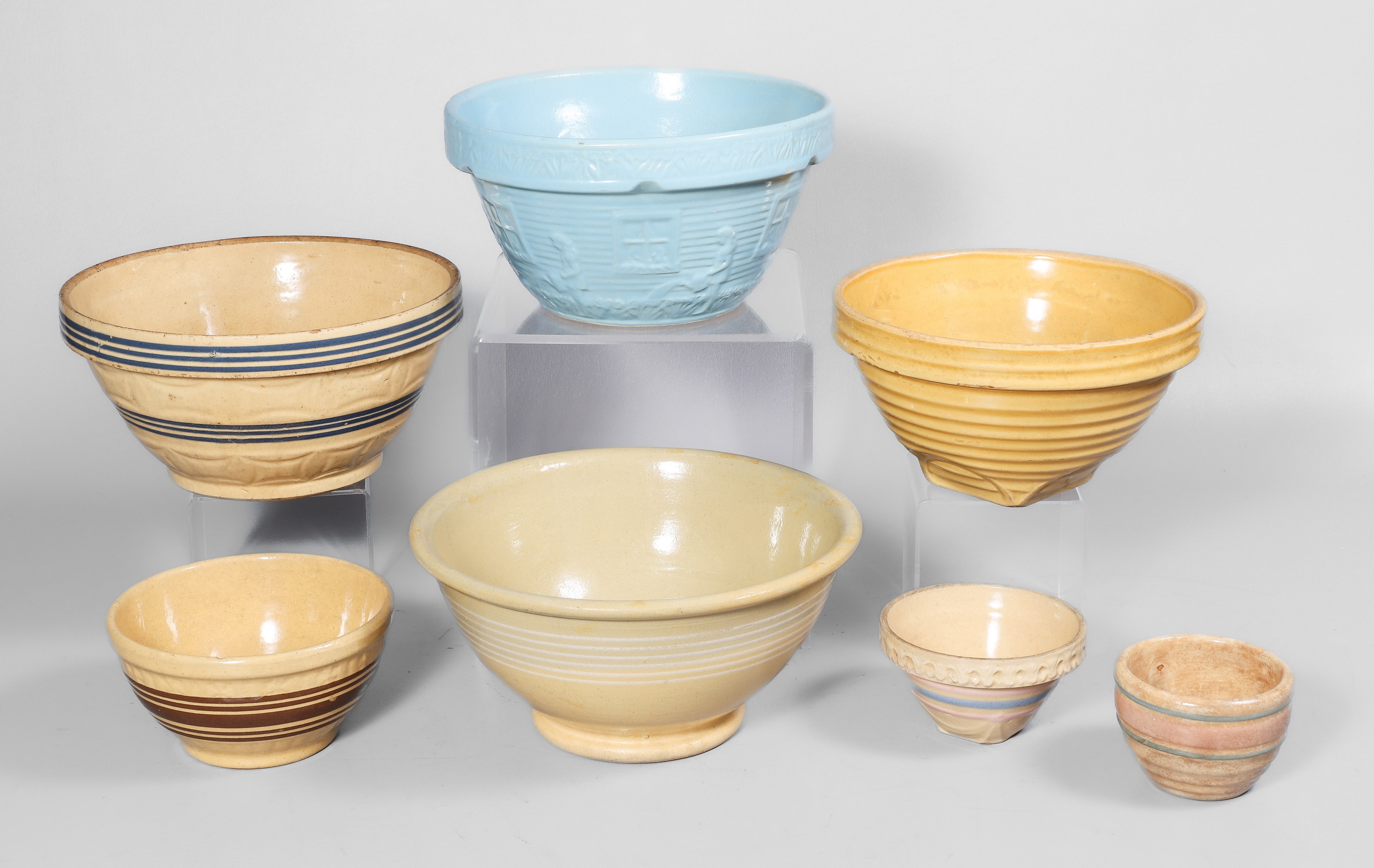 (7) Stoneware mixing bowls, c/o white