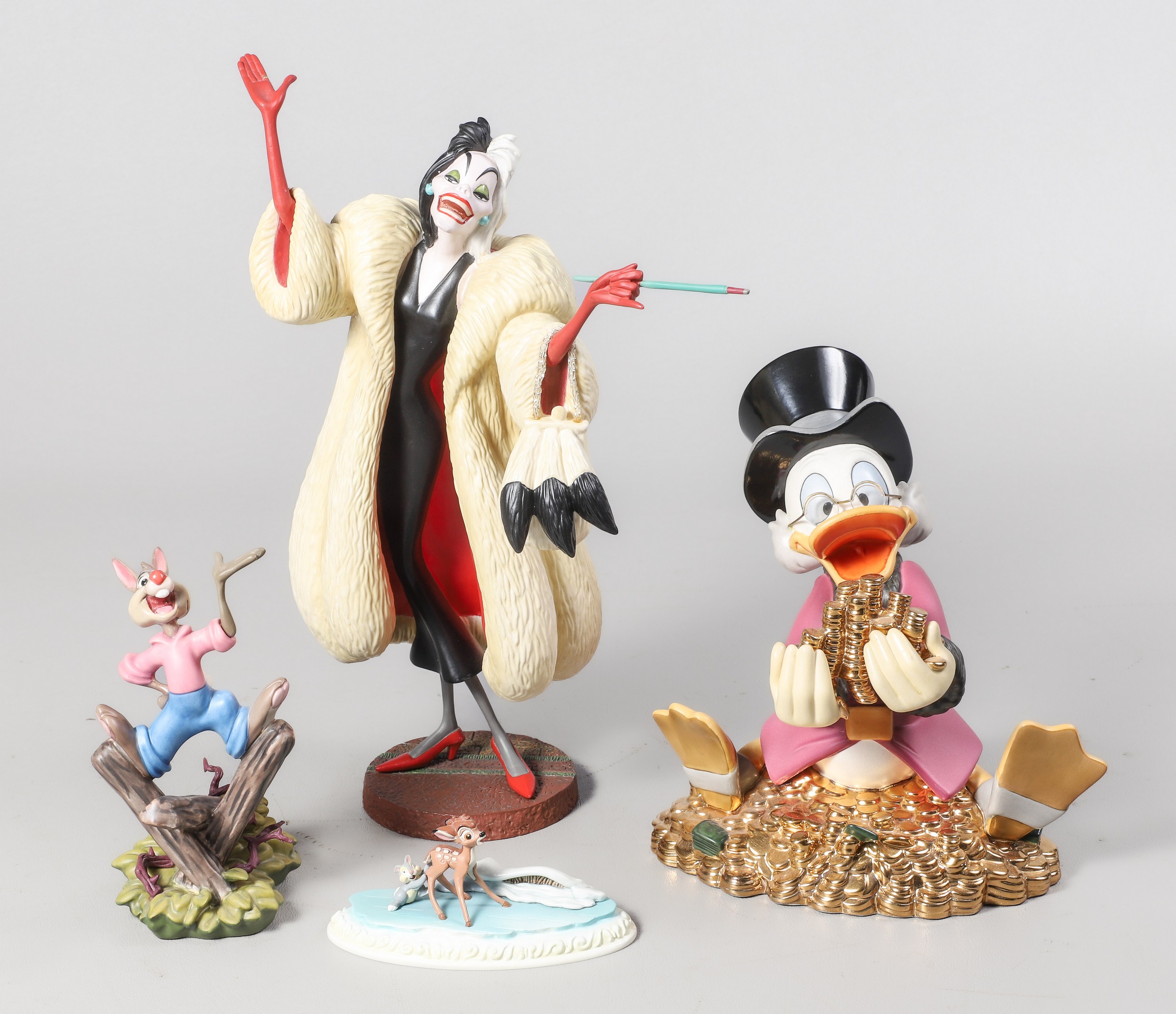 (4) Disney figurines, c/o Walt