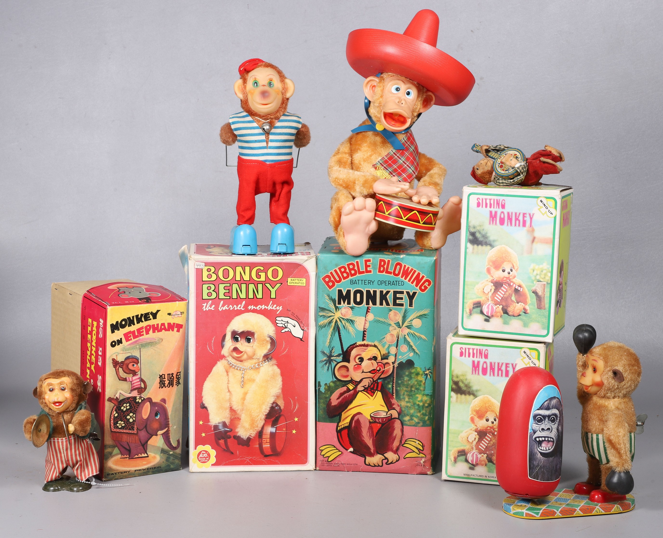 A group of vintage monkey themed toys