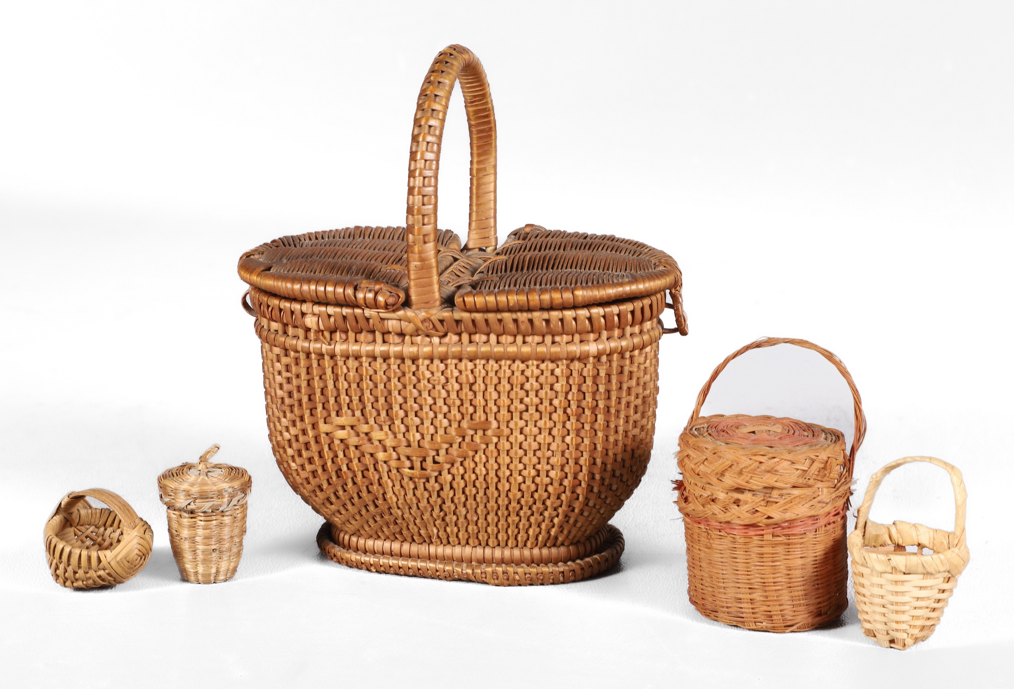 (5) Diminutive miniature woven baskets,