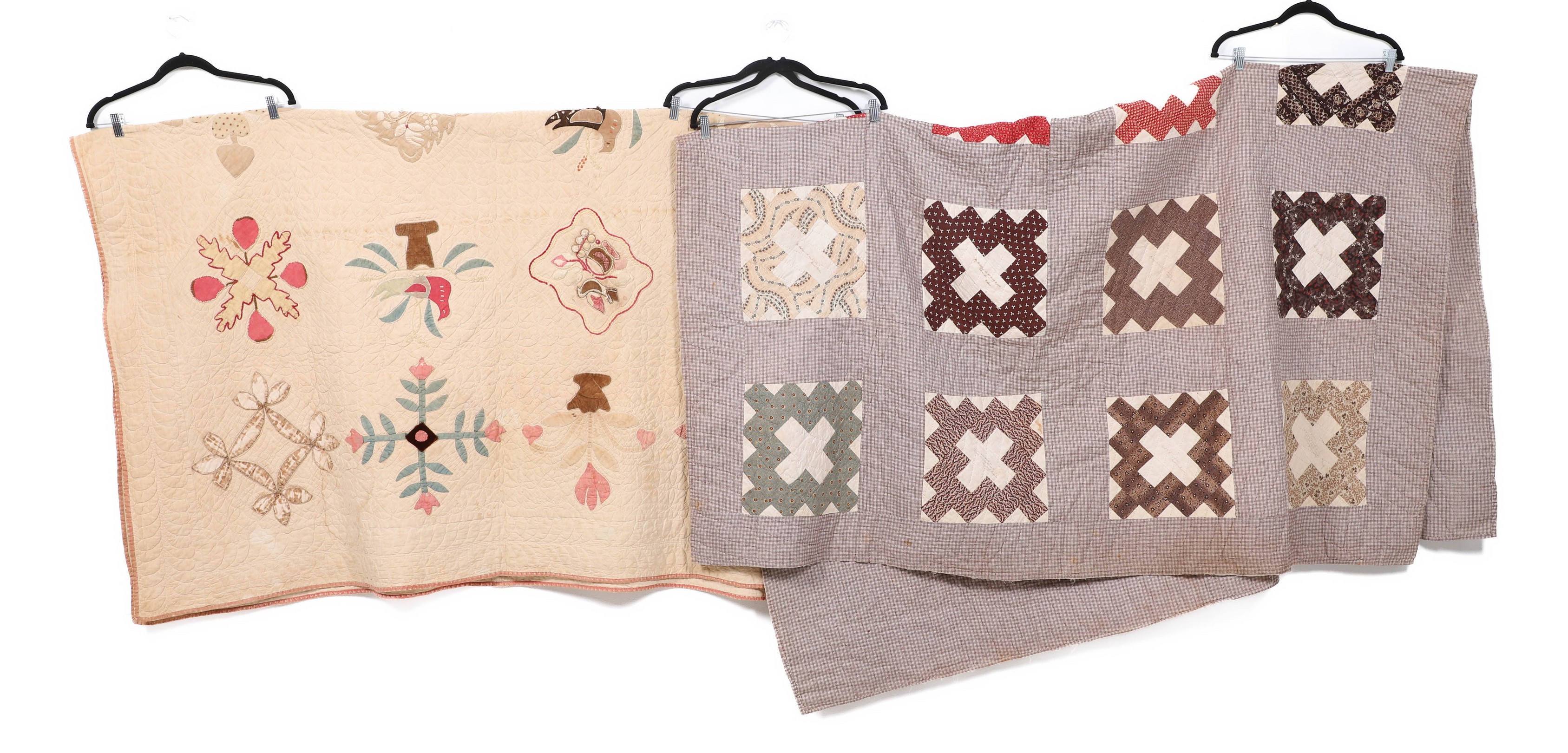 (2) Patchwork and trapunto quilts,