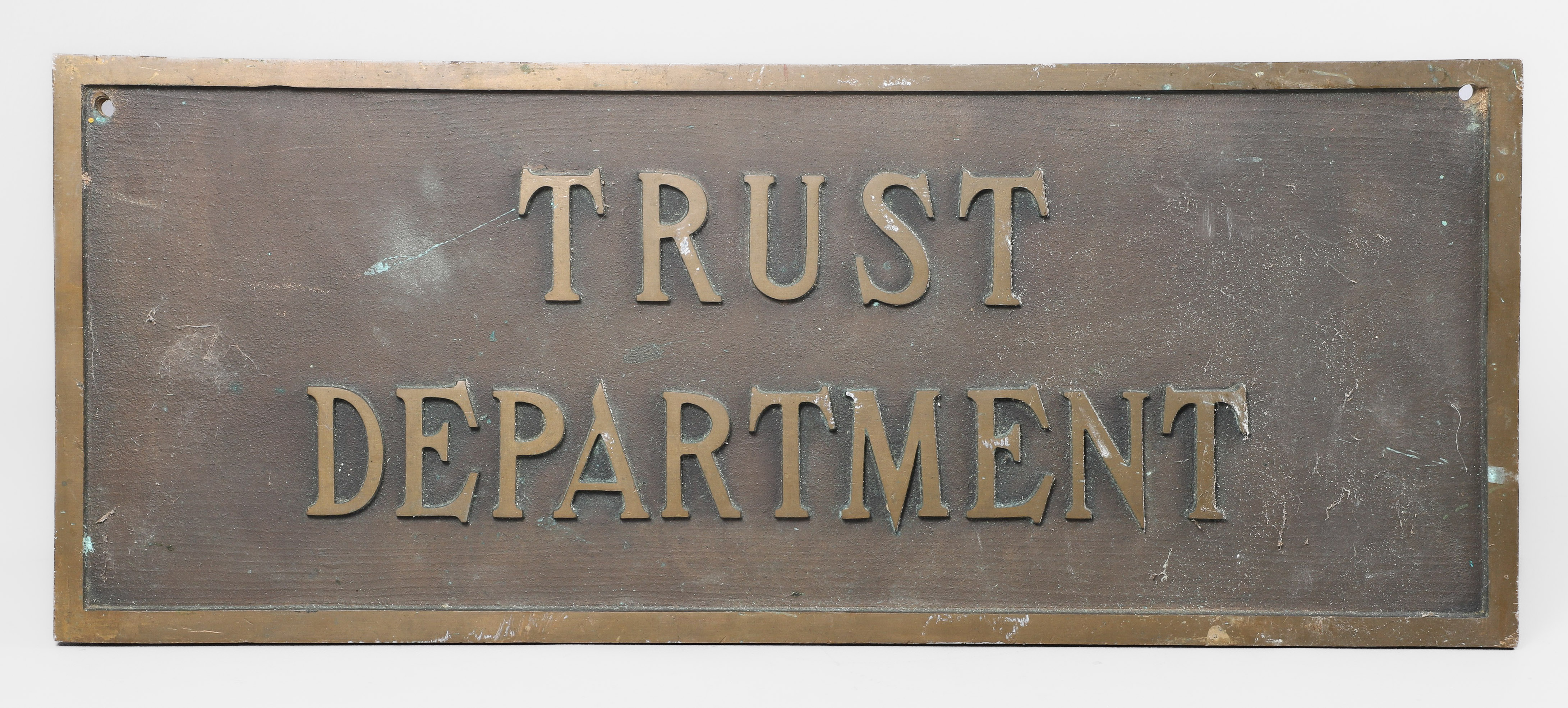 a bronze Trust Department wall plaque,