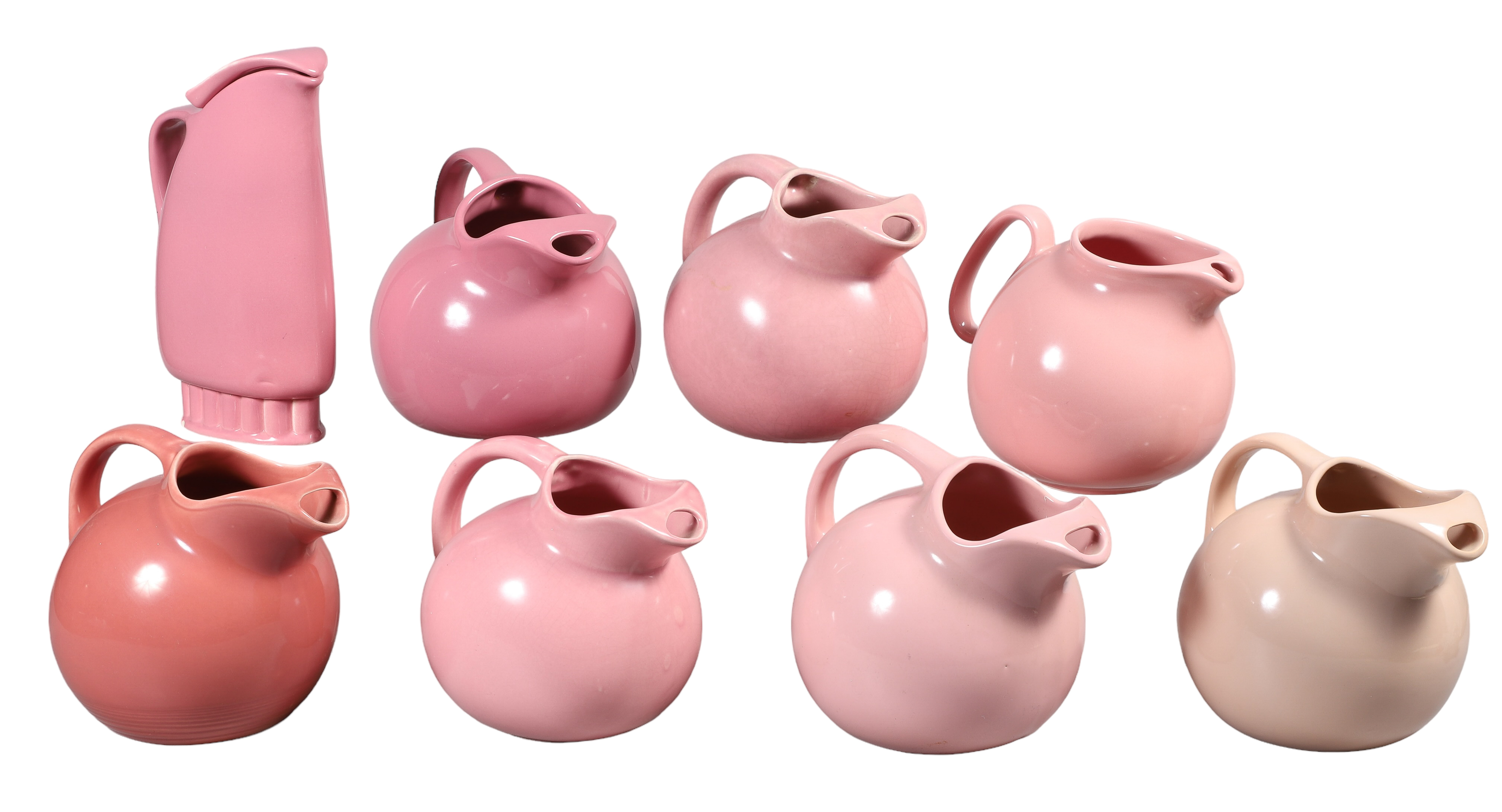 (8) Pink pottery pitchers c/o USA