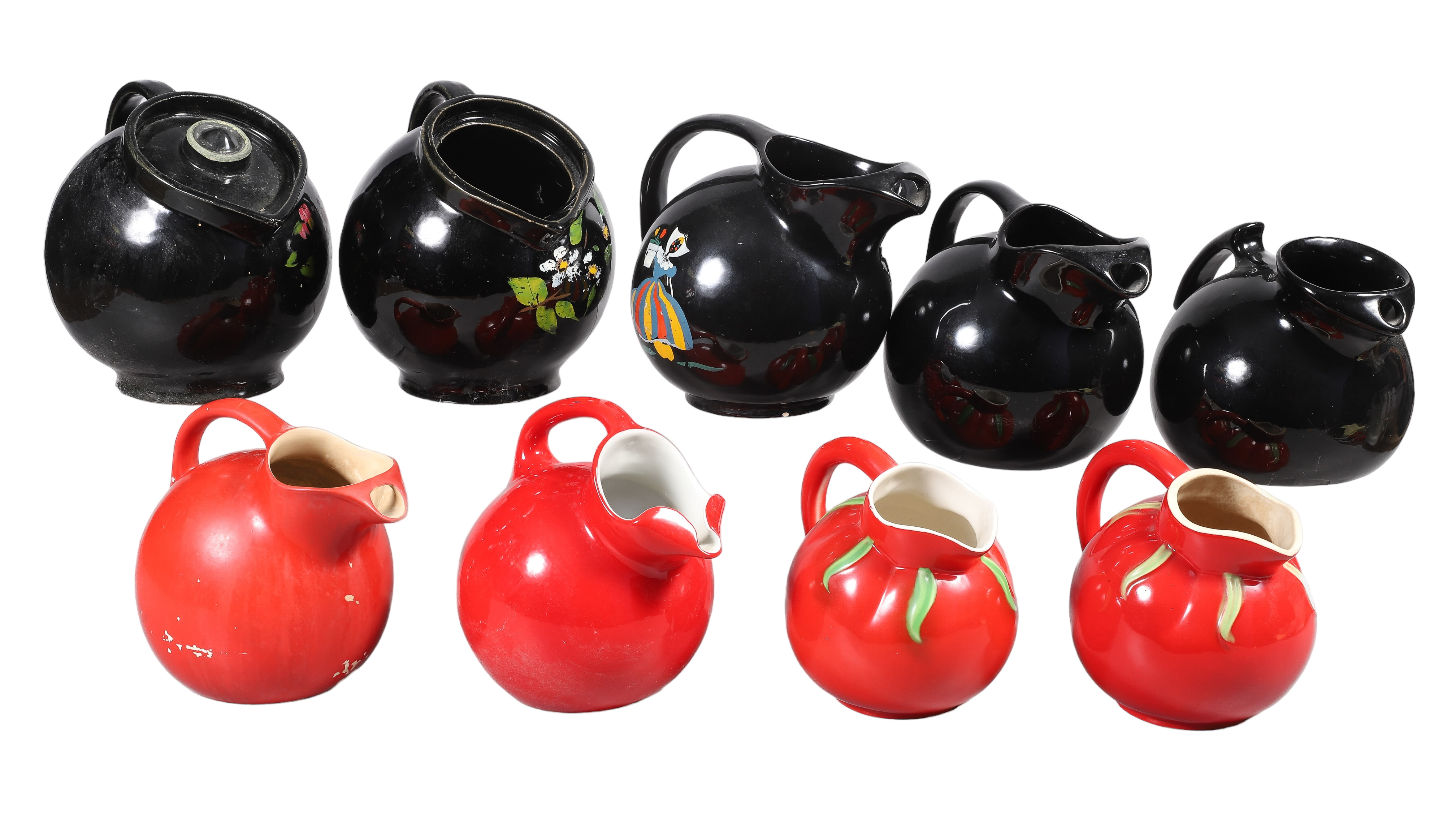 (8) Black and red pottery pitchers,