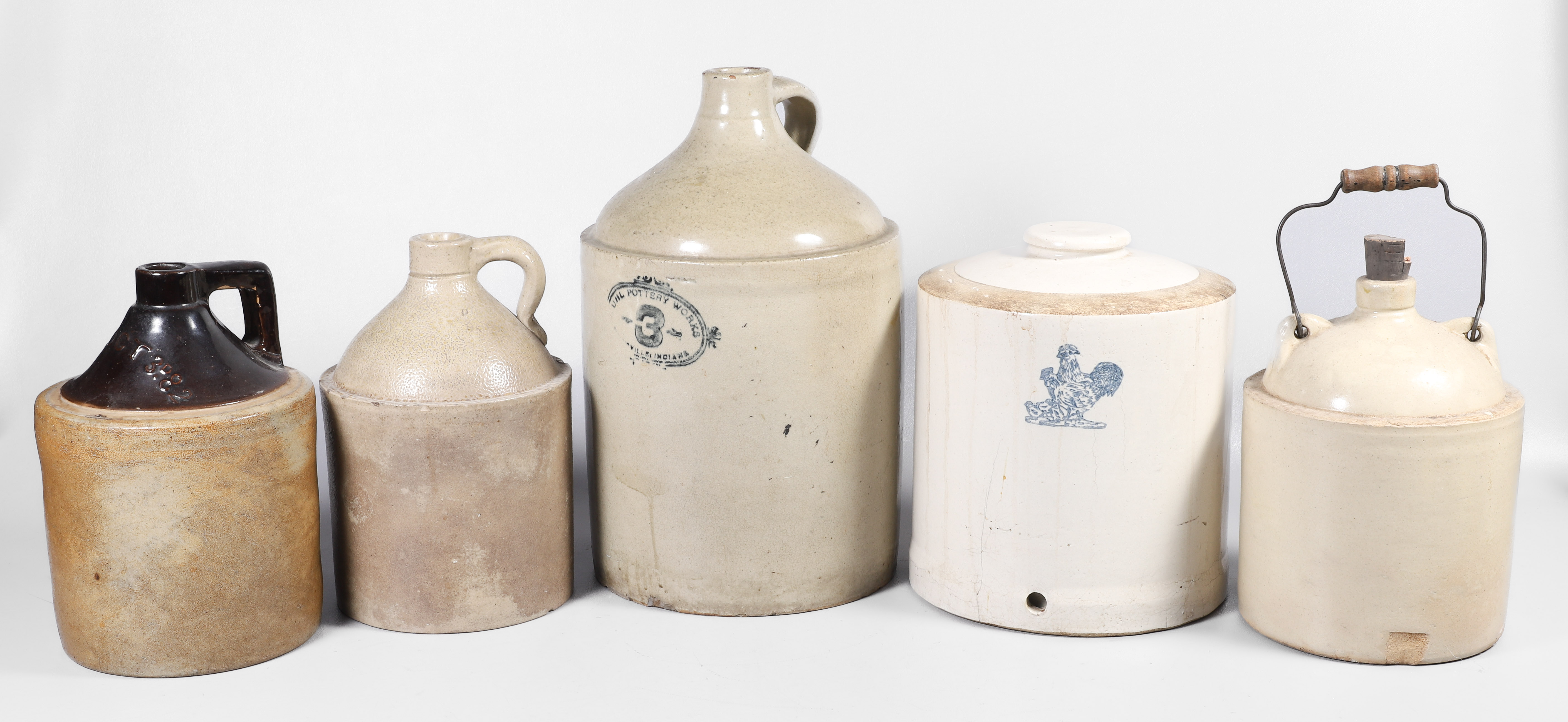 Stoneware jugs and chicken feeder 2e1ab0