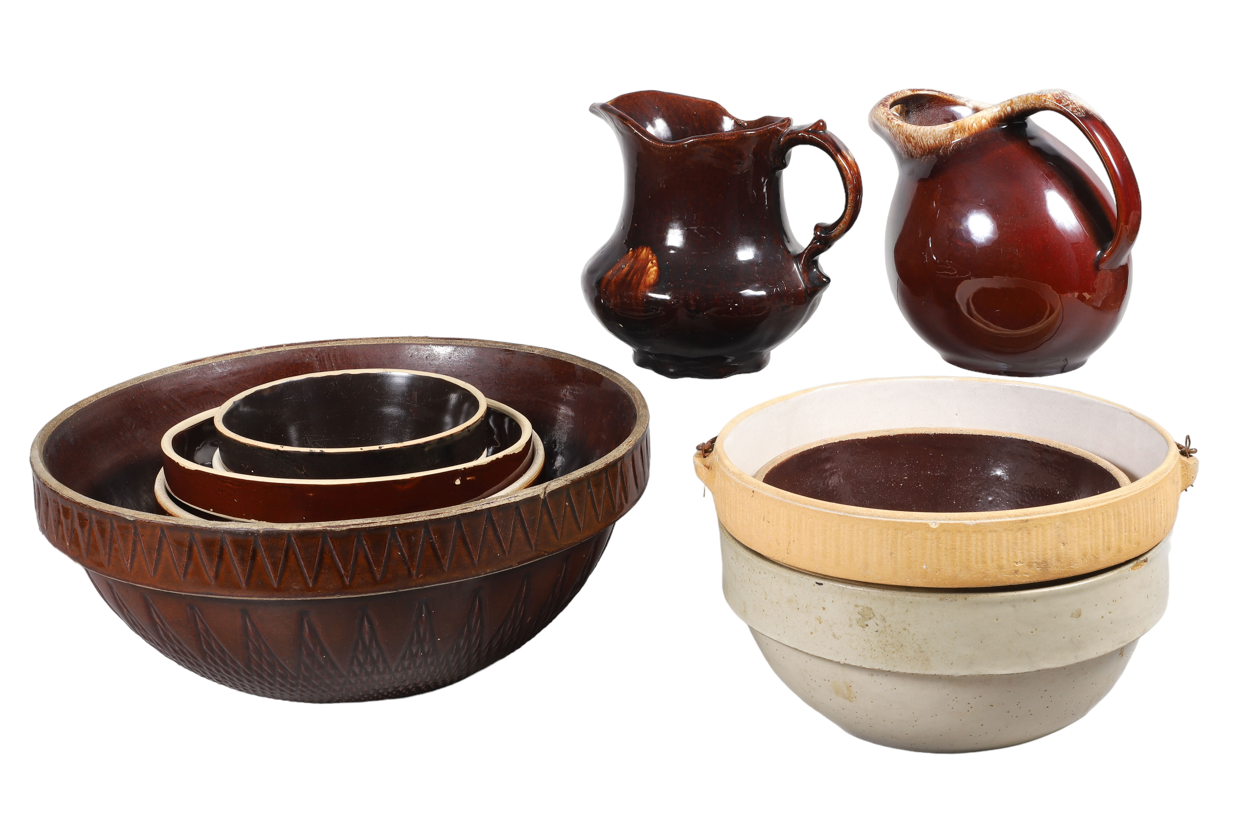 Brown and cream pottery mixing bowls