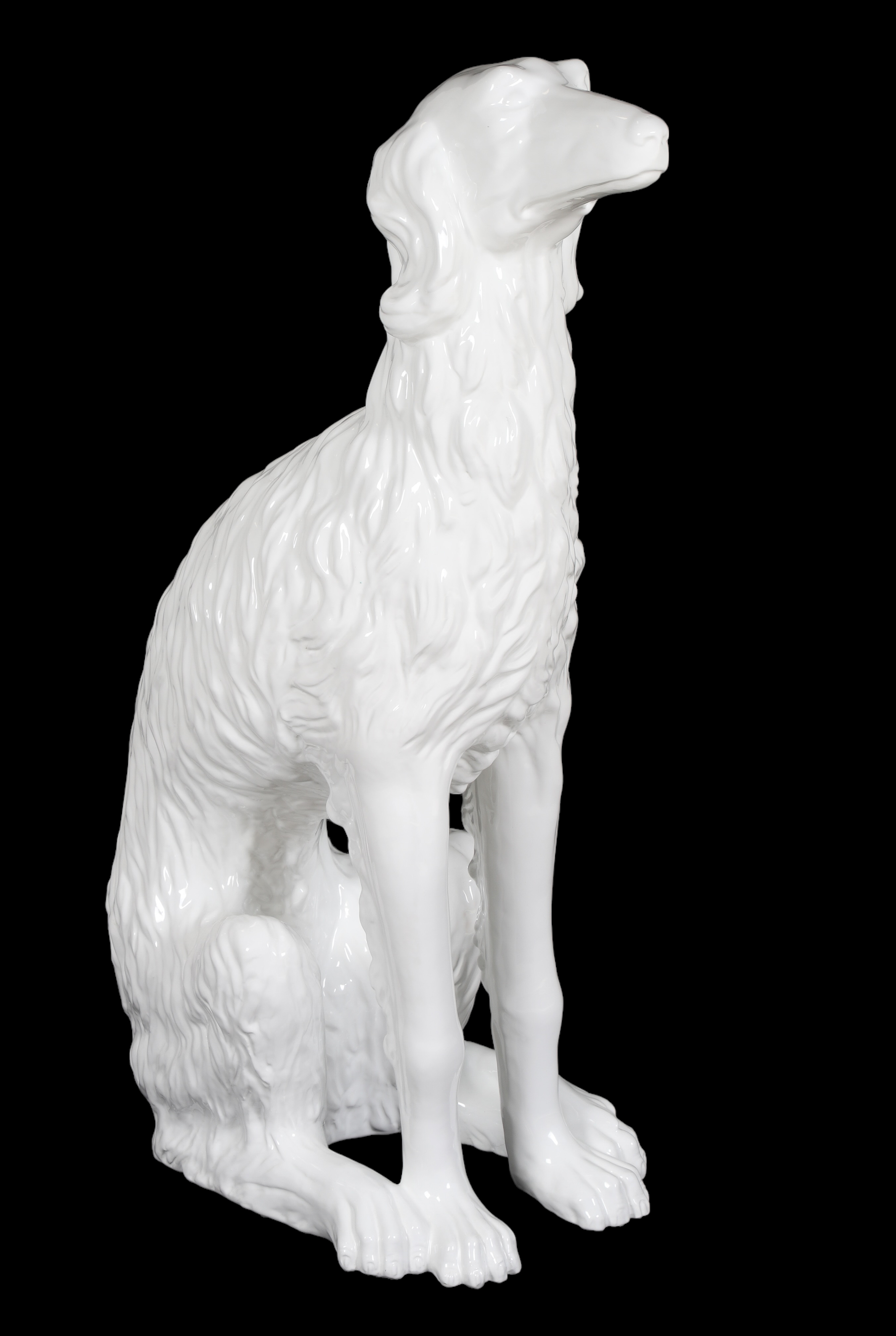 Ceramic statue of whippet in sitting