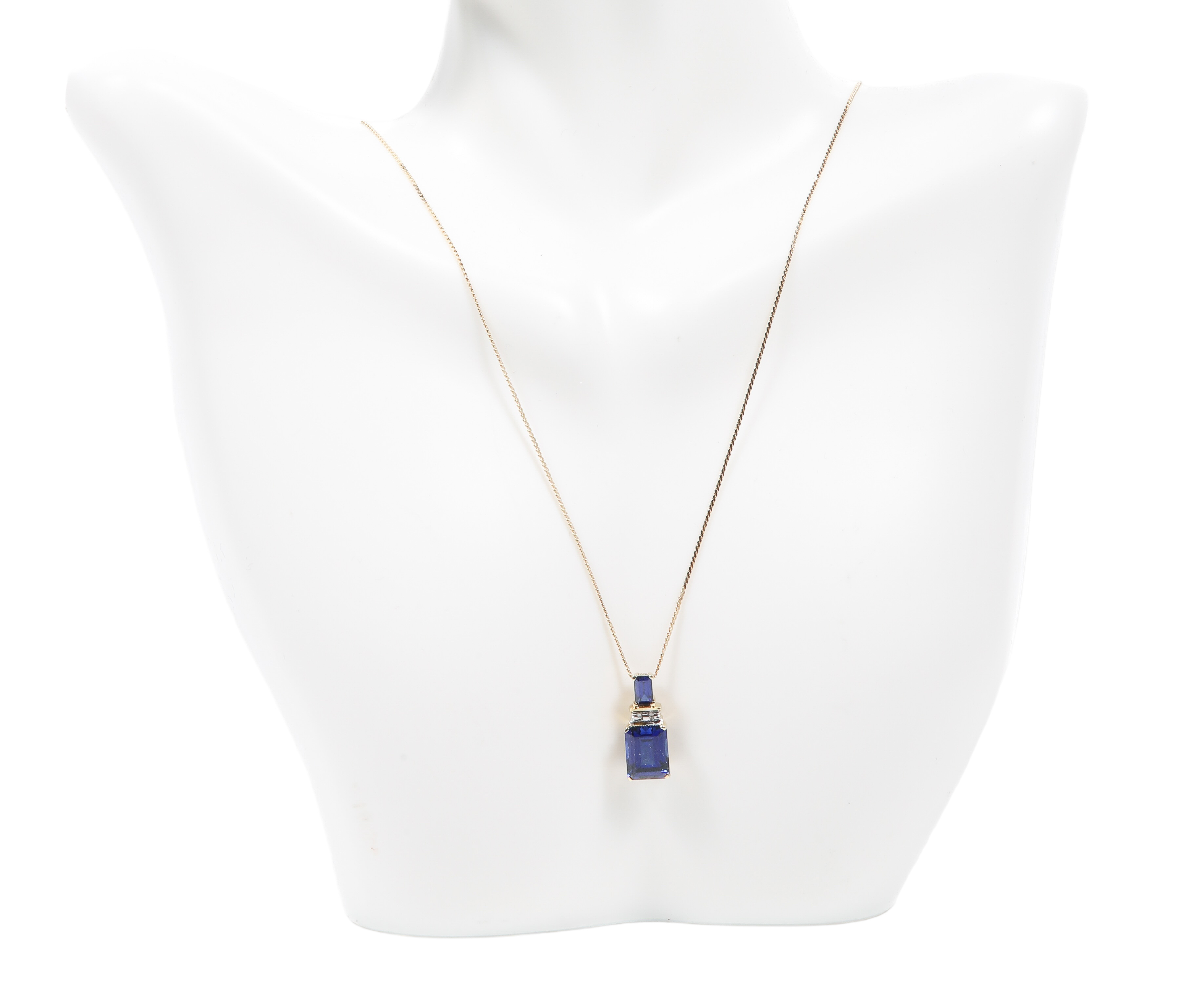 Sapphire and diamond pendant necklace,