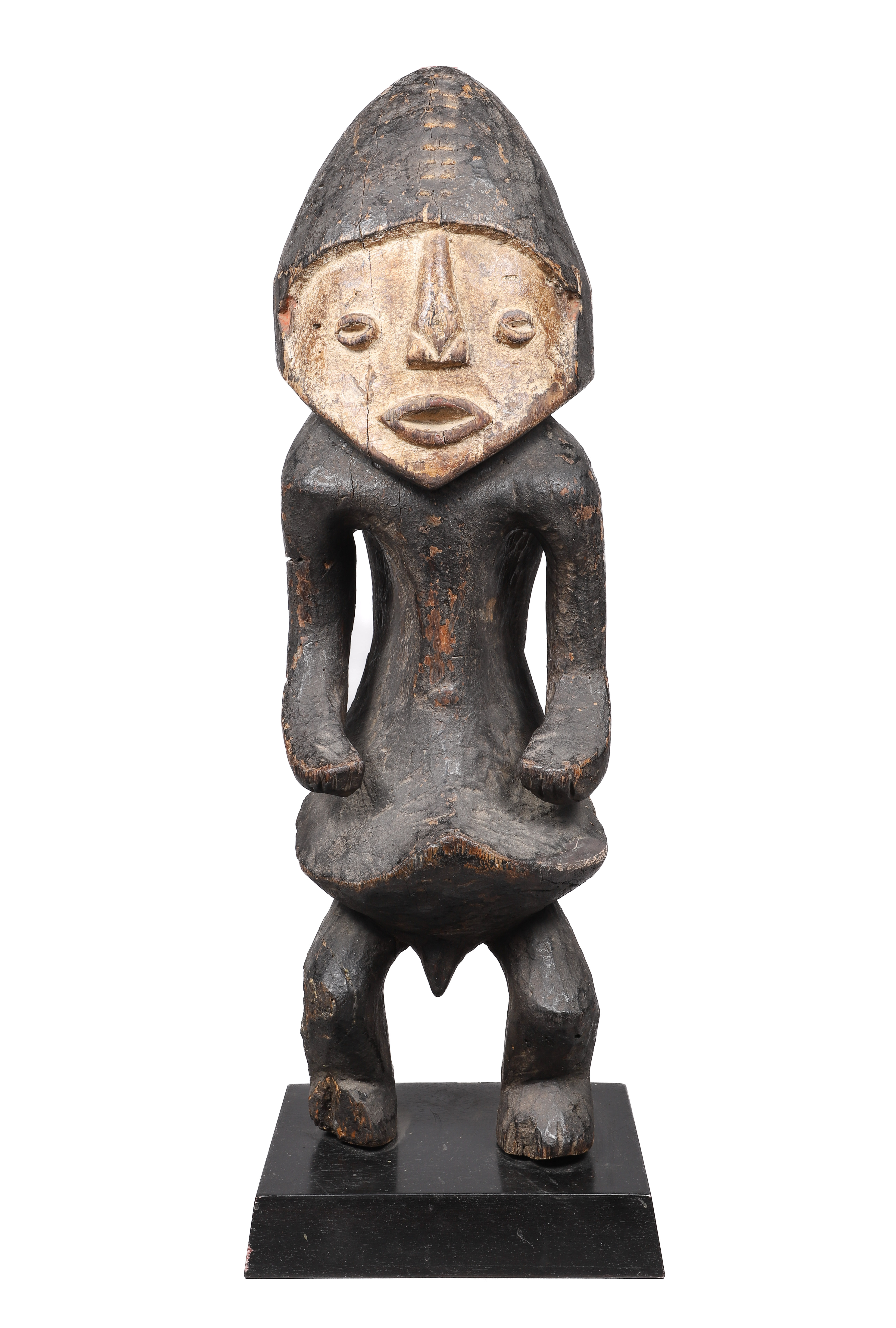 Carved wood tribal spirit figure, possibly