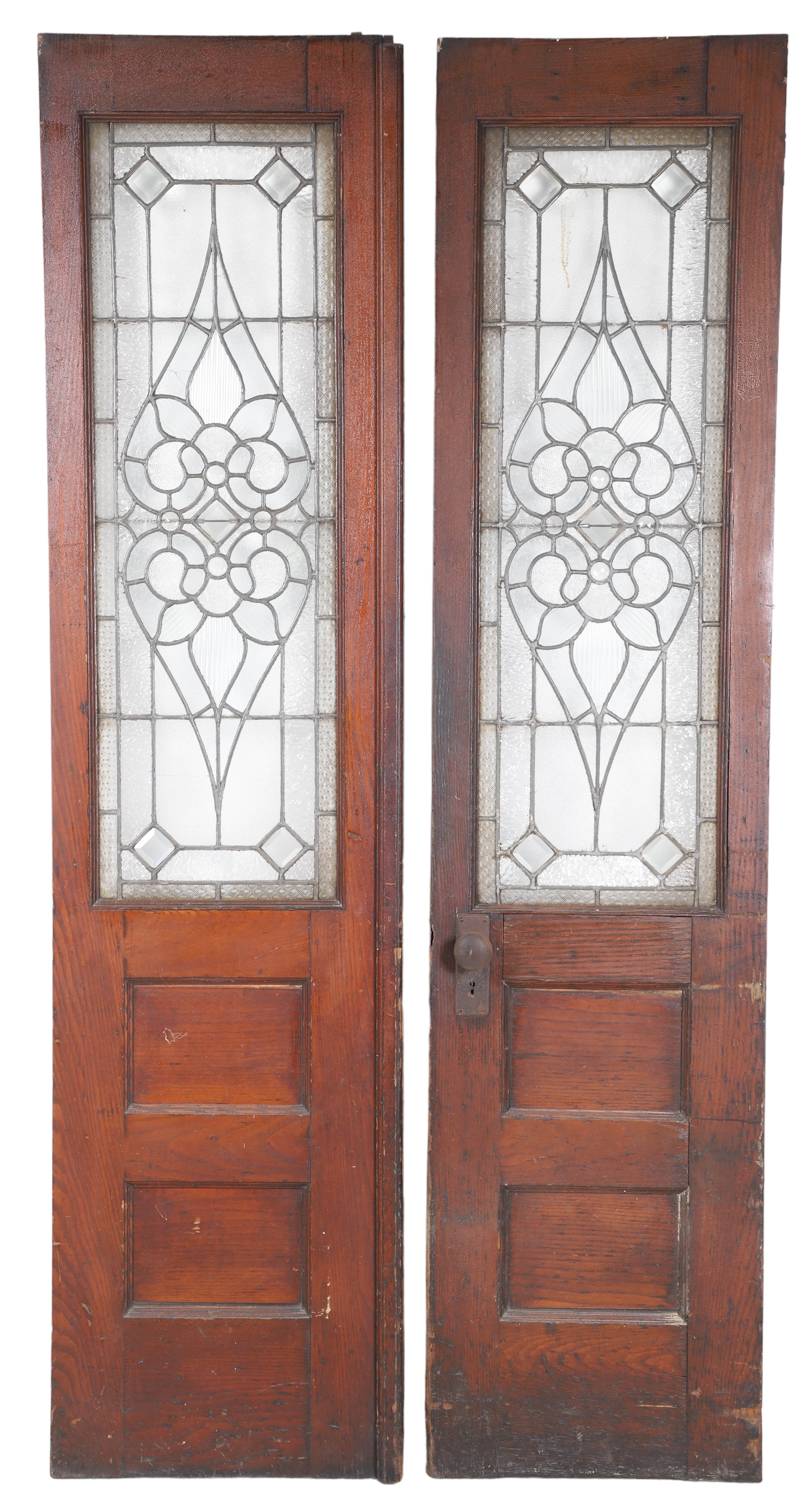 Pair paneled cherry doors w/ stained