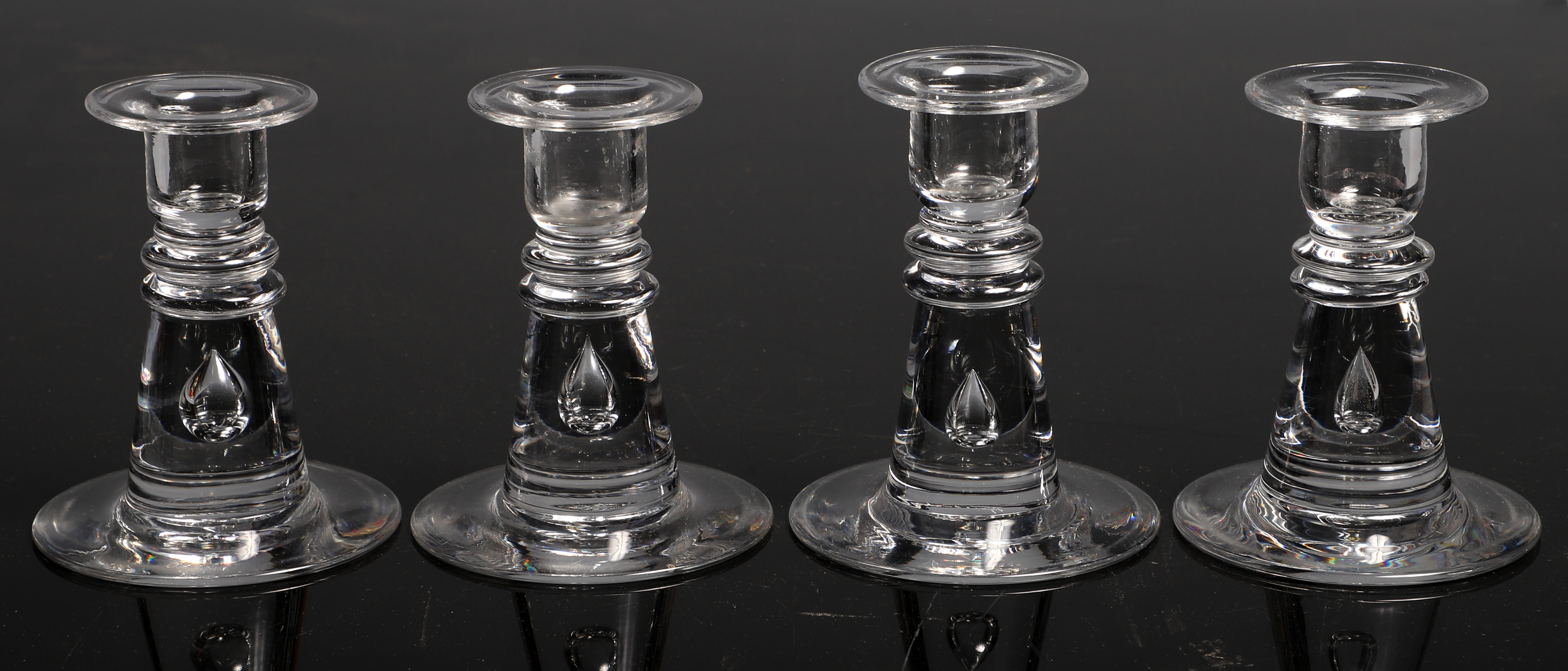 (4) Steuben crystal candlesticks with