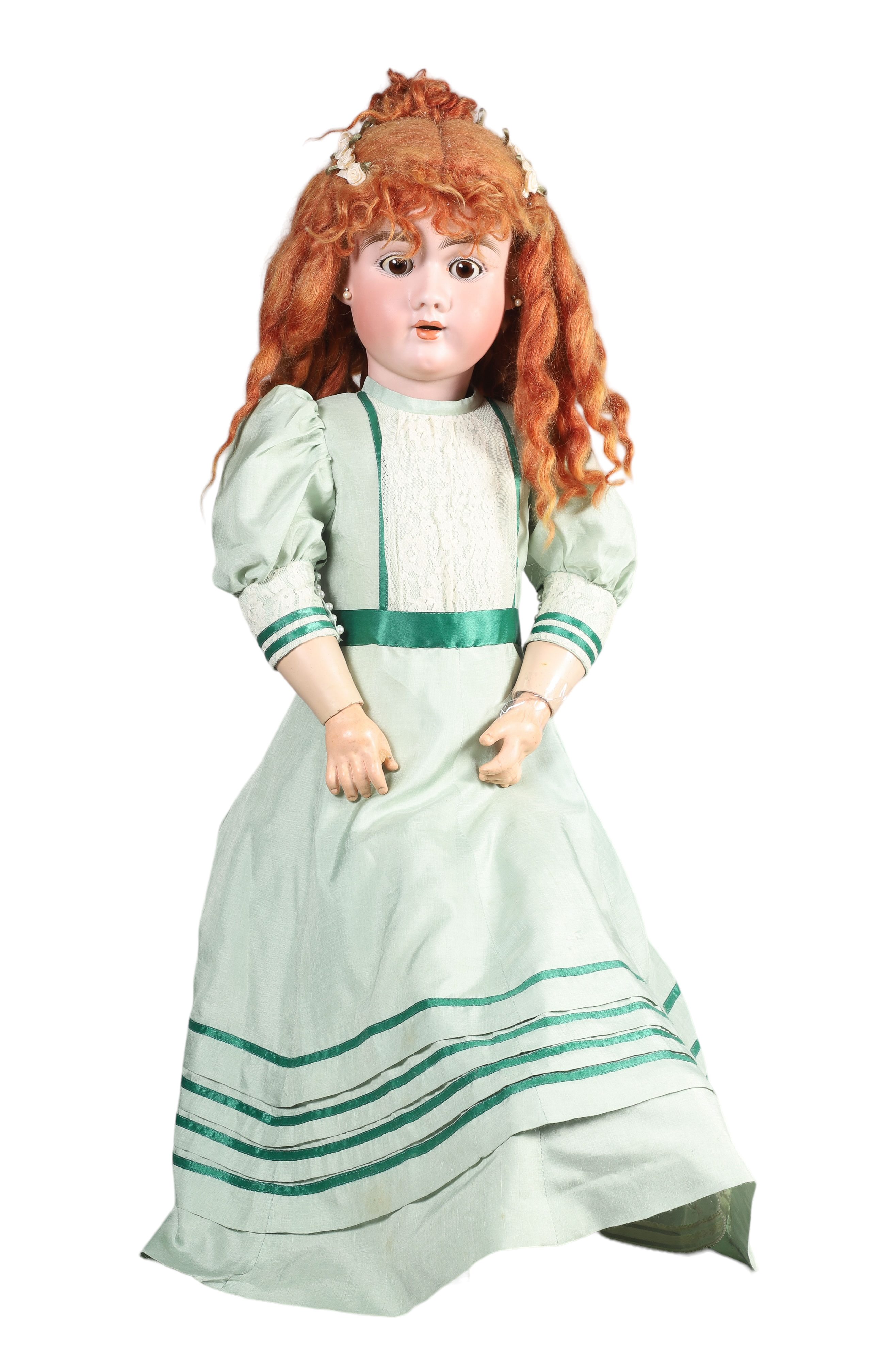 Large porcelain doll, open mouth, no