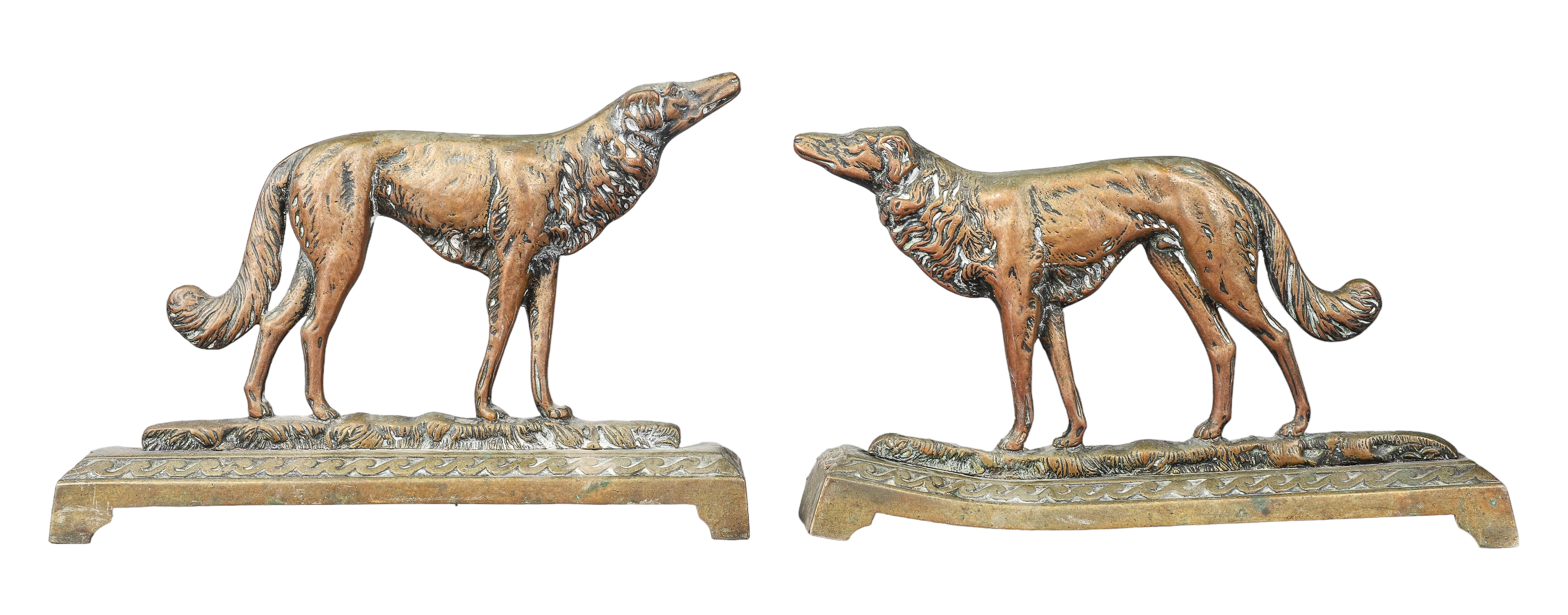 A pair of brass whippets perhaps 2e1f11
