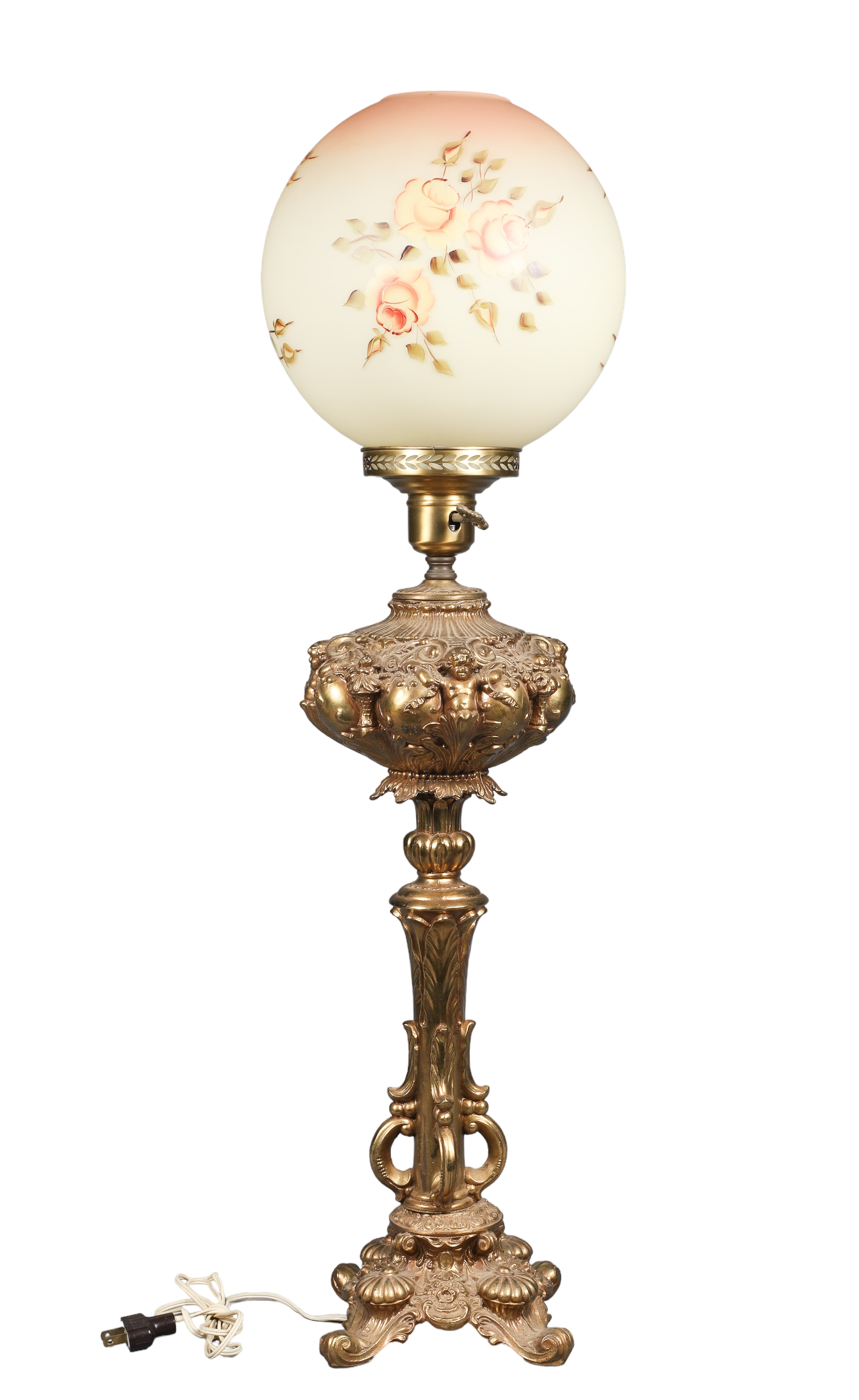 Brass banquet lamp, embossed cherub