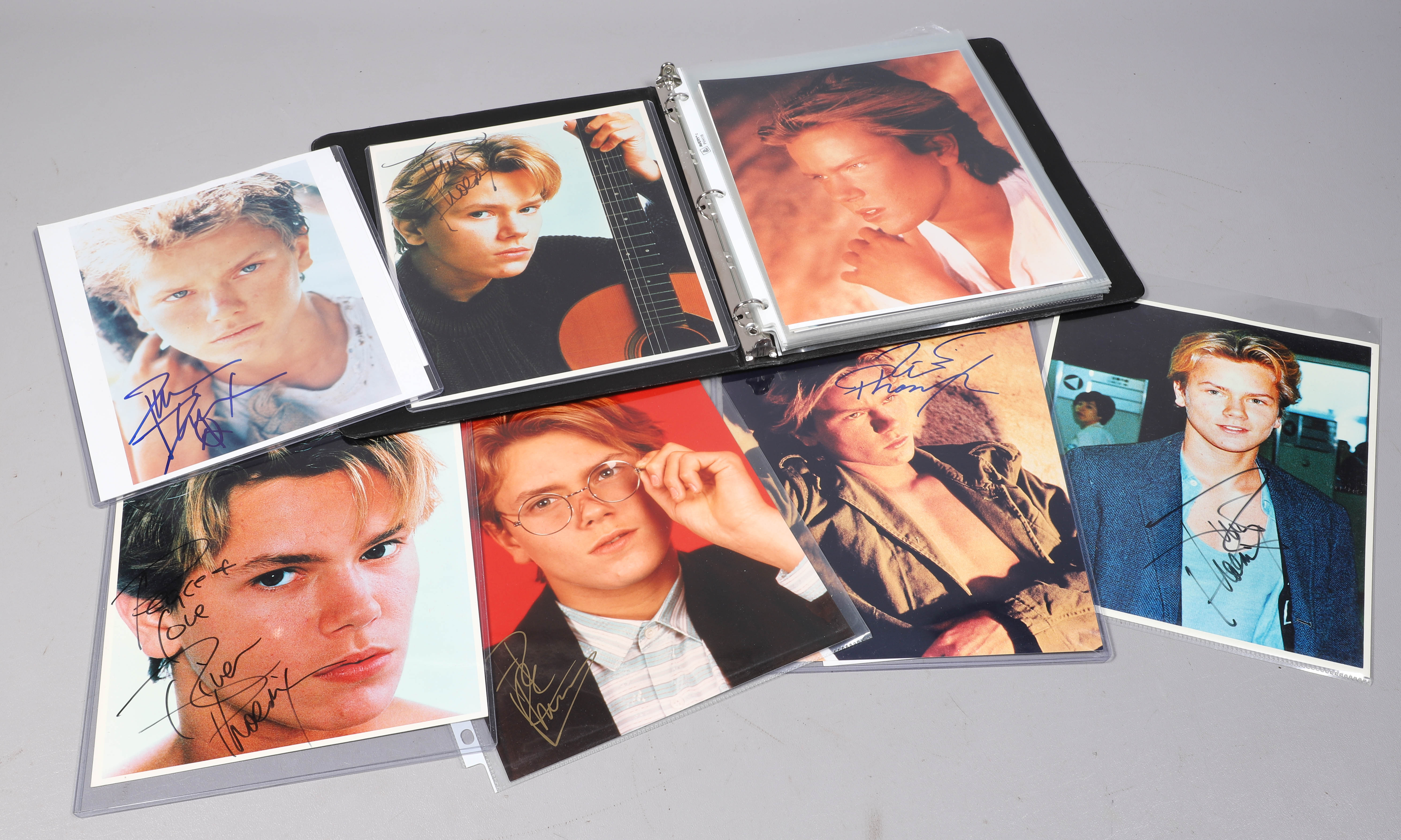 Binder of 23 River Phoenix photos  2e1f57