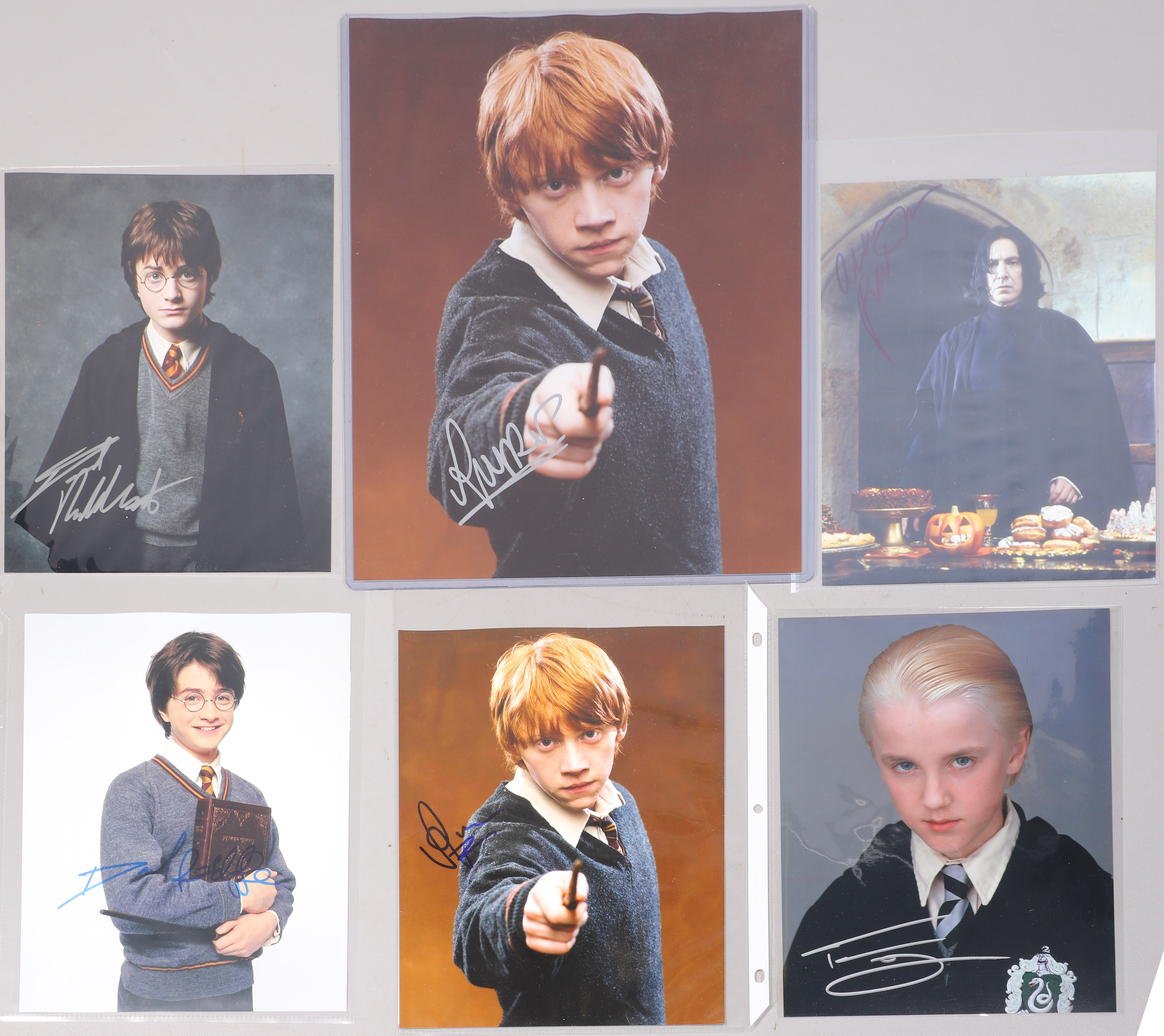 (6) Photos signed by Harry Potter