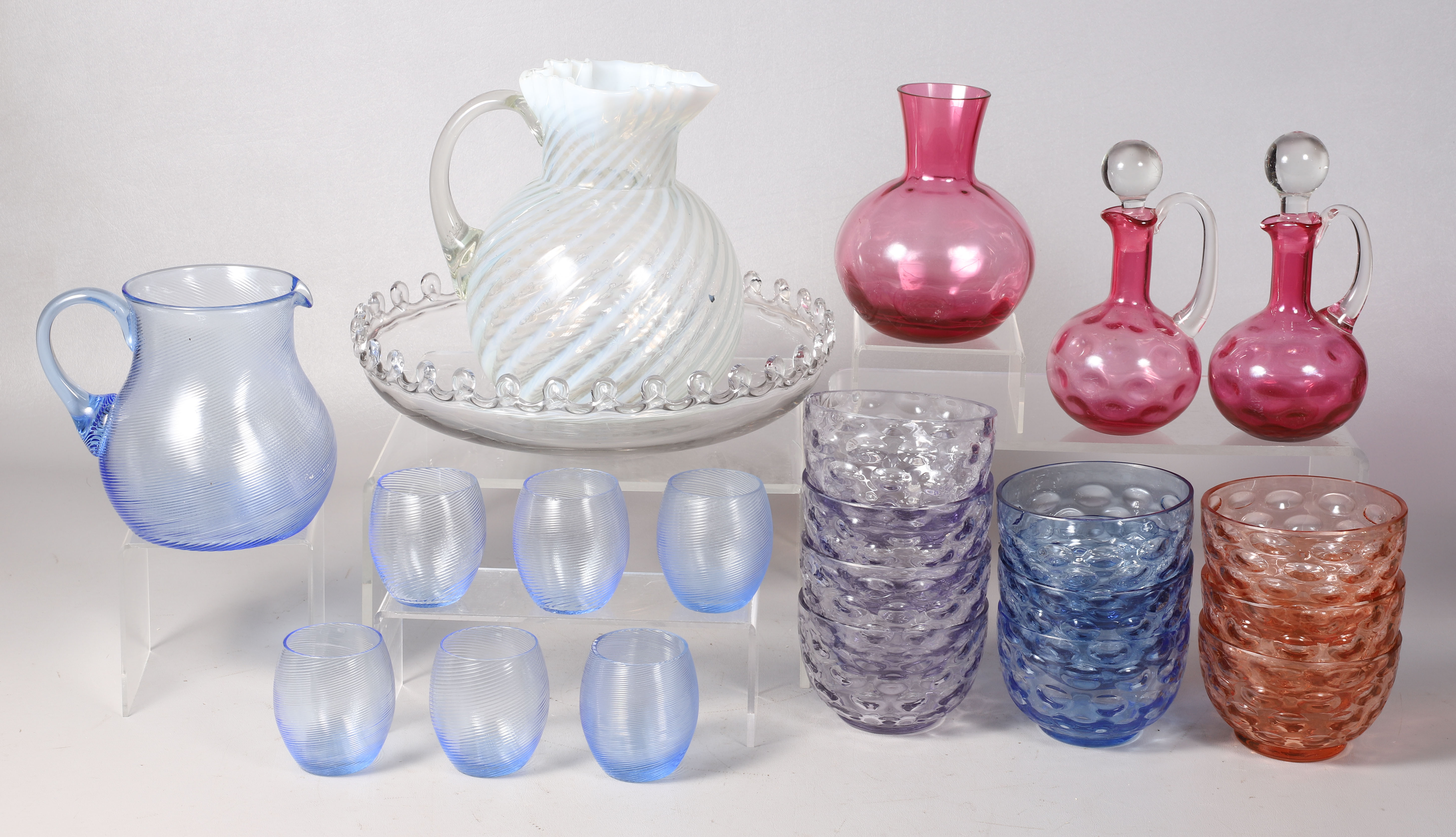 Thumbprint bowls, swirl glass pitchers,