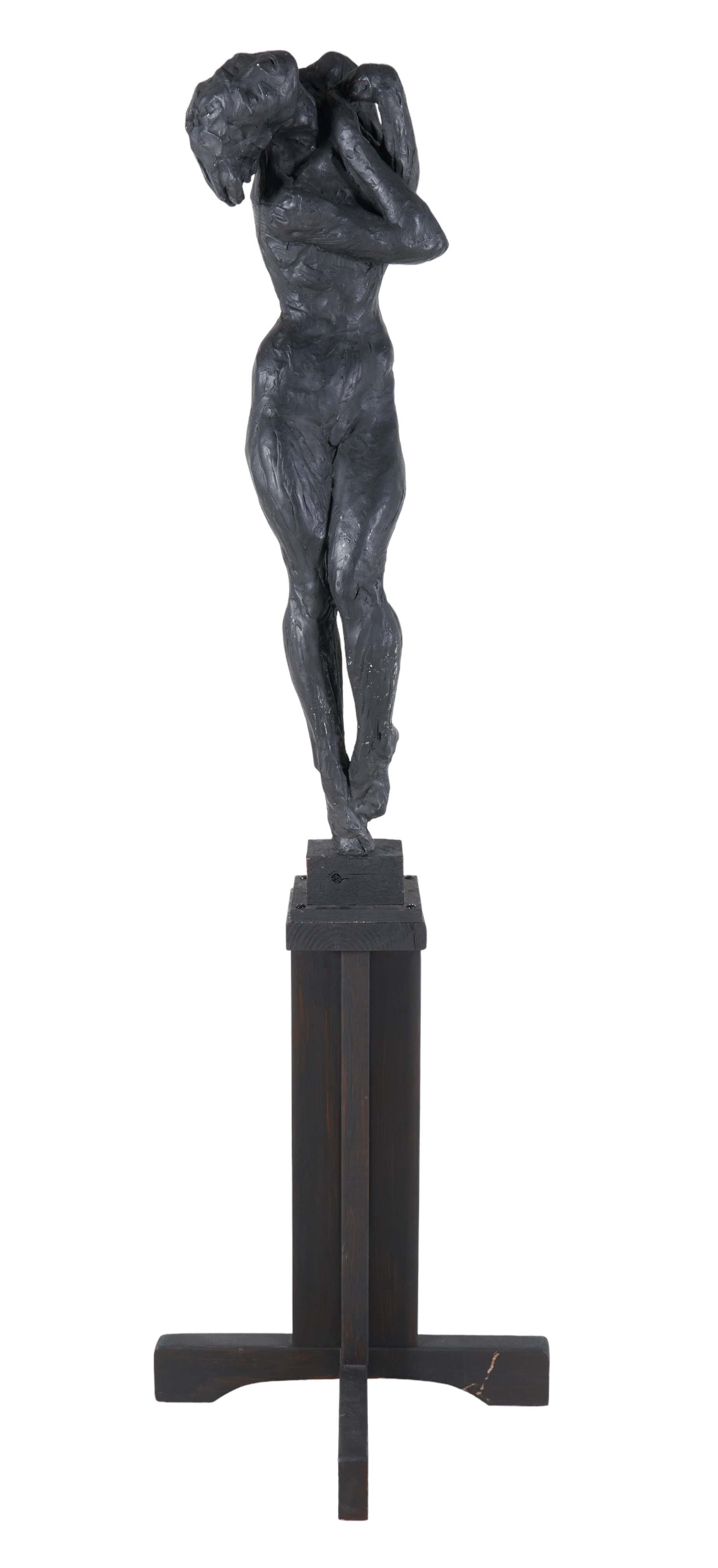 Black painted plaster sculpture of a