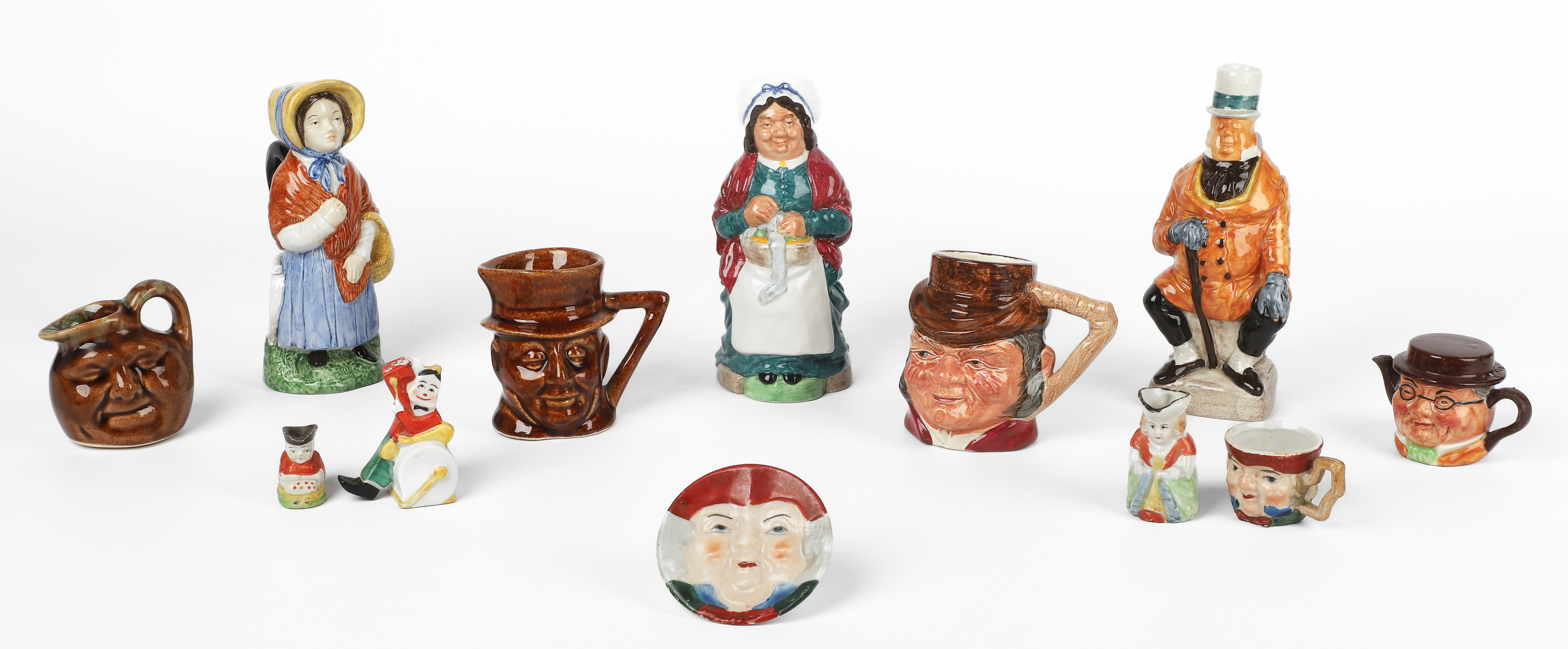  12 Porcelain figural items including 2e23bd