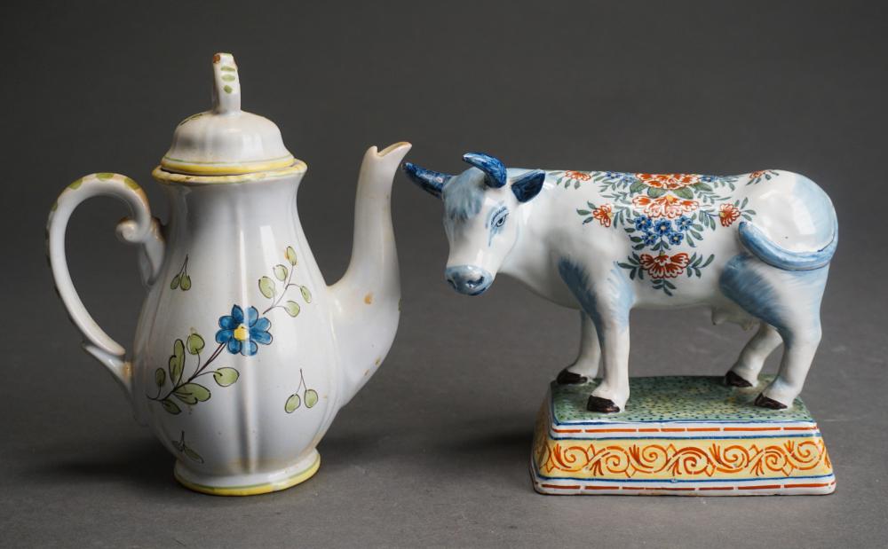 FAIENCE FIGURE OF A COW AND A TEAPOT 2e4e4b