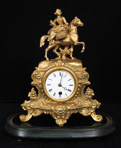 Gilt metal mantle clock    Modeled to