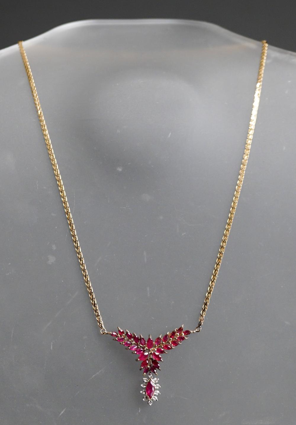 14 KARAT YELLOW GOLD RUBY AND 2e4f31