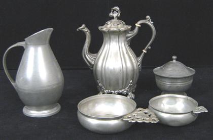 Pewter teapot    With floral finial,