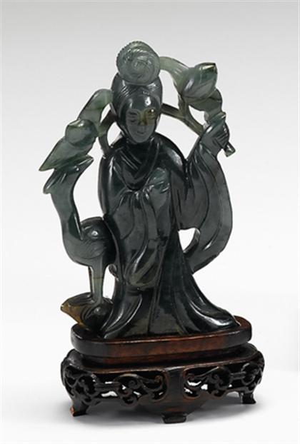 Pair of Chinese spinach jade Guanyin 4a207