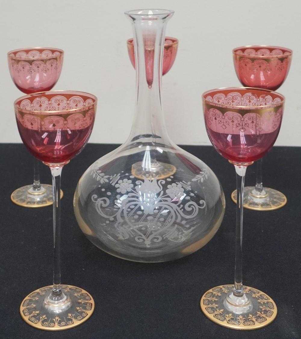 ETCHED GLASS DECANTER AND FIVE CRANBERRY-TO-CLEAR