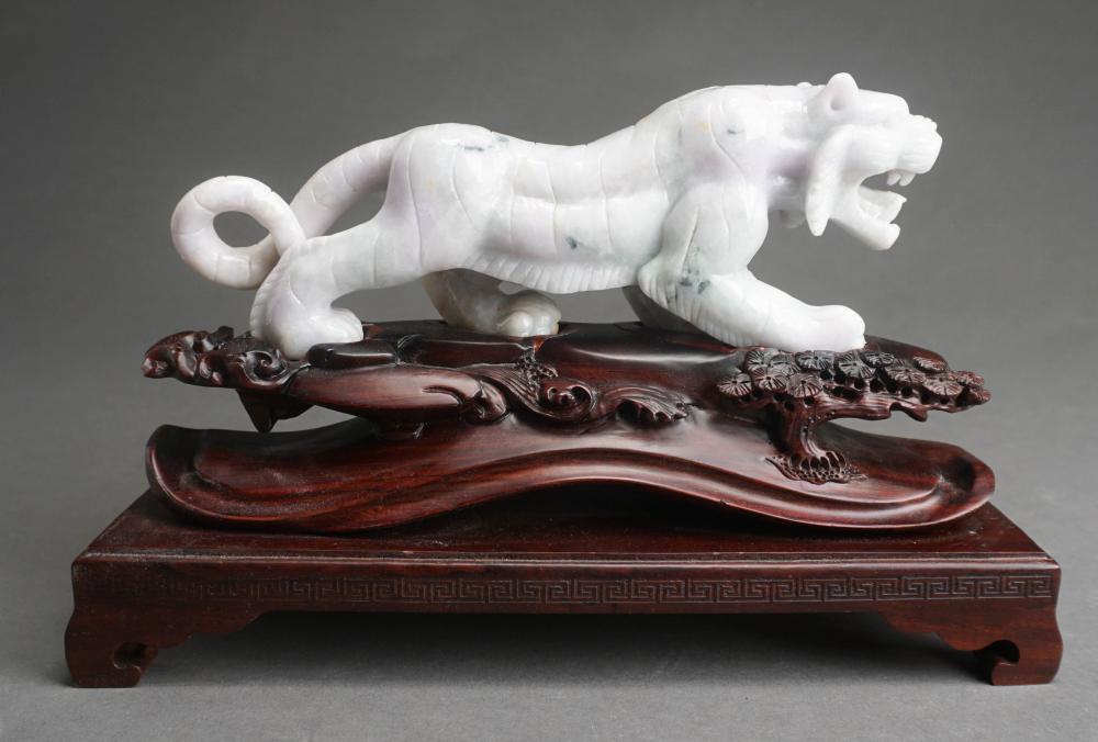CHINESE CARVED JADE LION ON CARVED