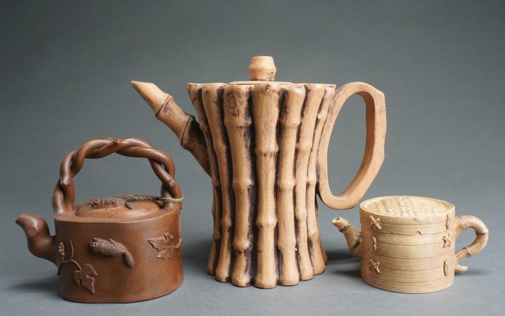 THREE ASIAN CERAMIC TEAPOTSThree