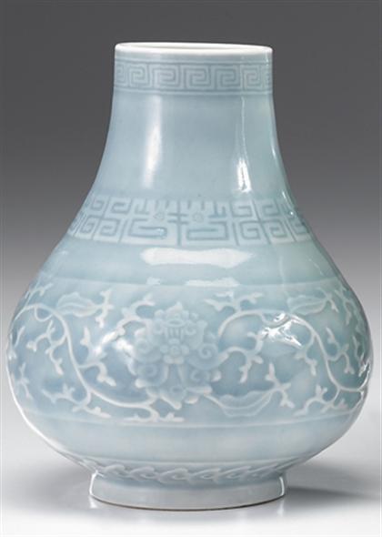 Chinese carved blue glazed Hu-shaped